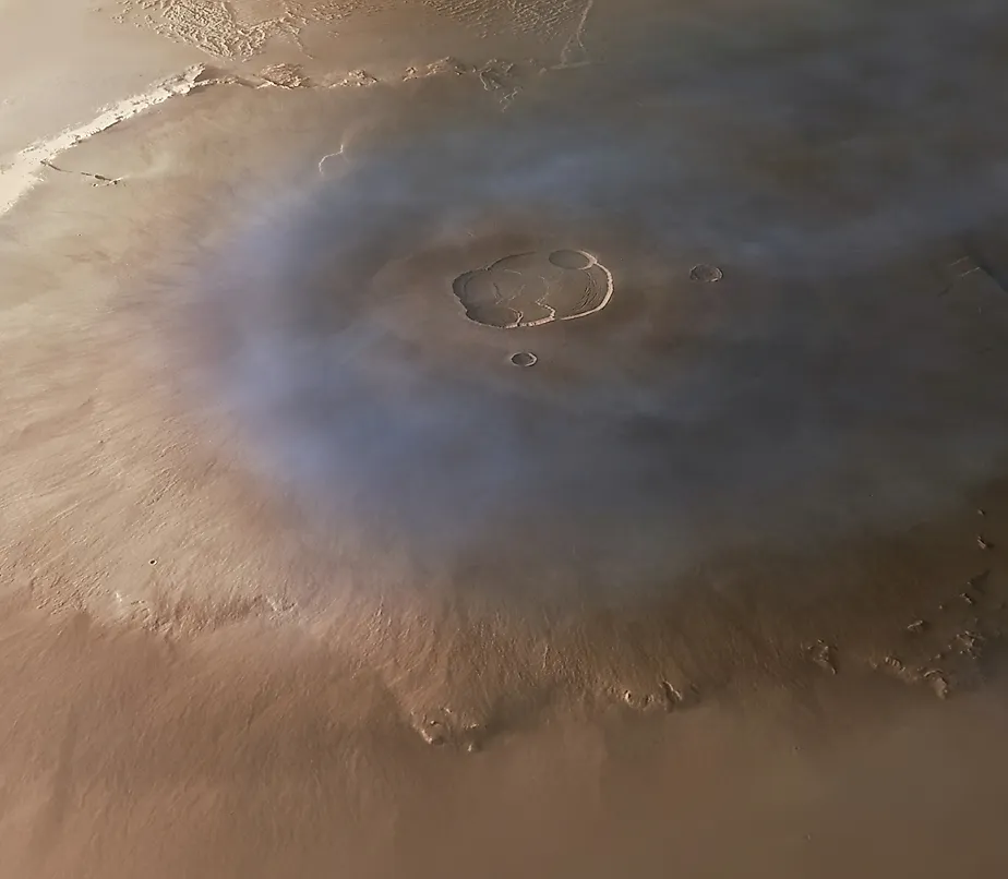 Olympus Mons volcano on Mars' surface. Editorial credit: Andera Luck, CC BY 2.0, via Wikimedia Commons