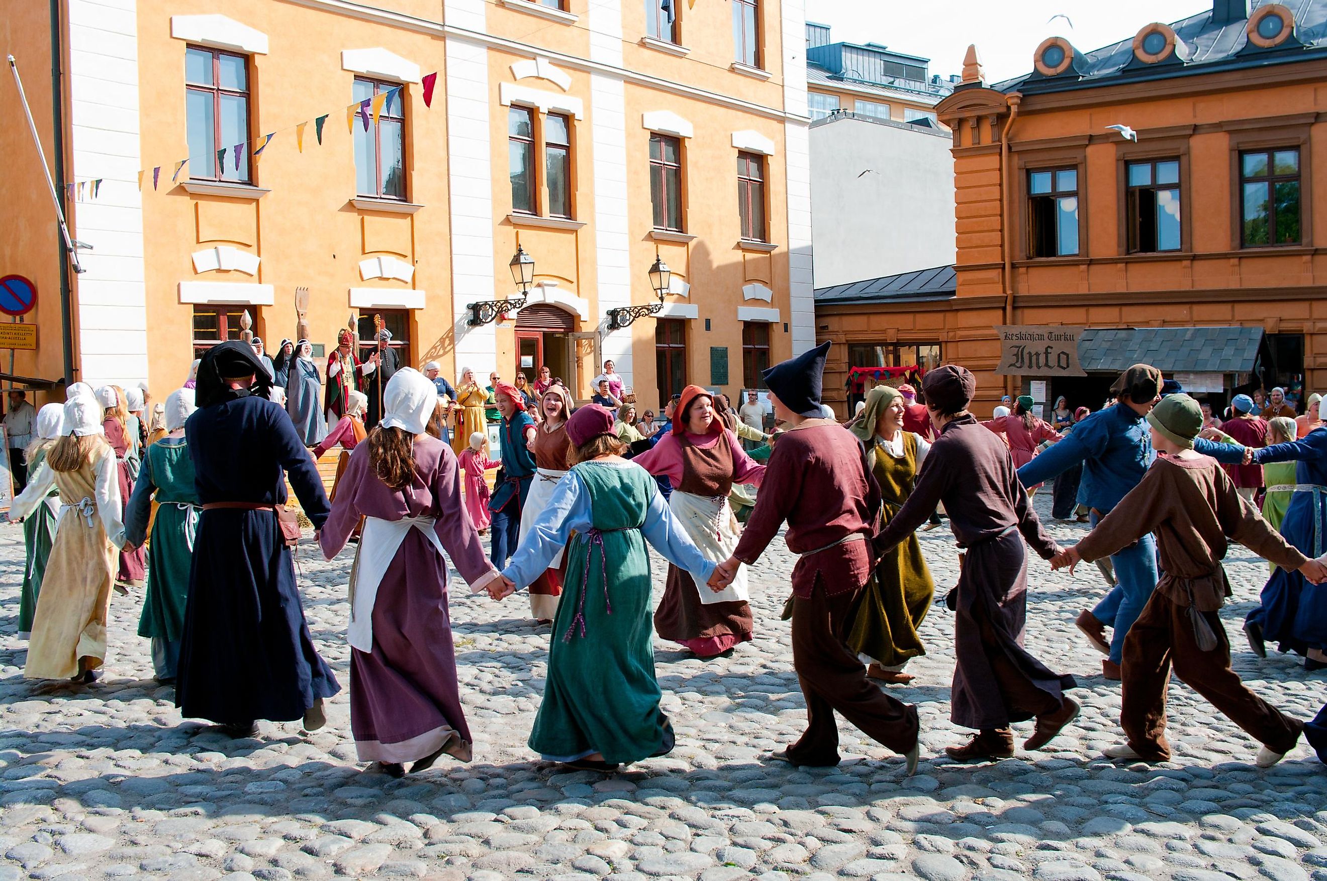 Actors re-enacting Medieval era dance of Carole.