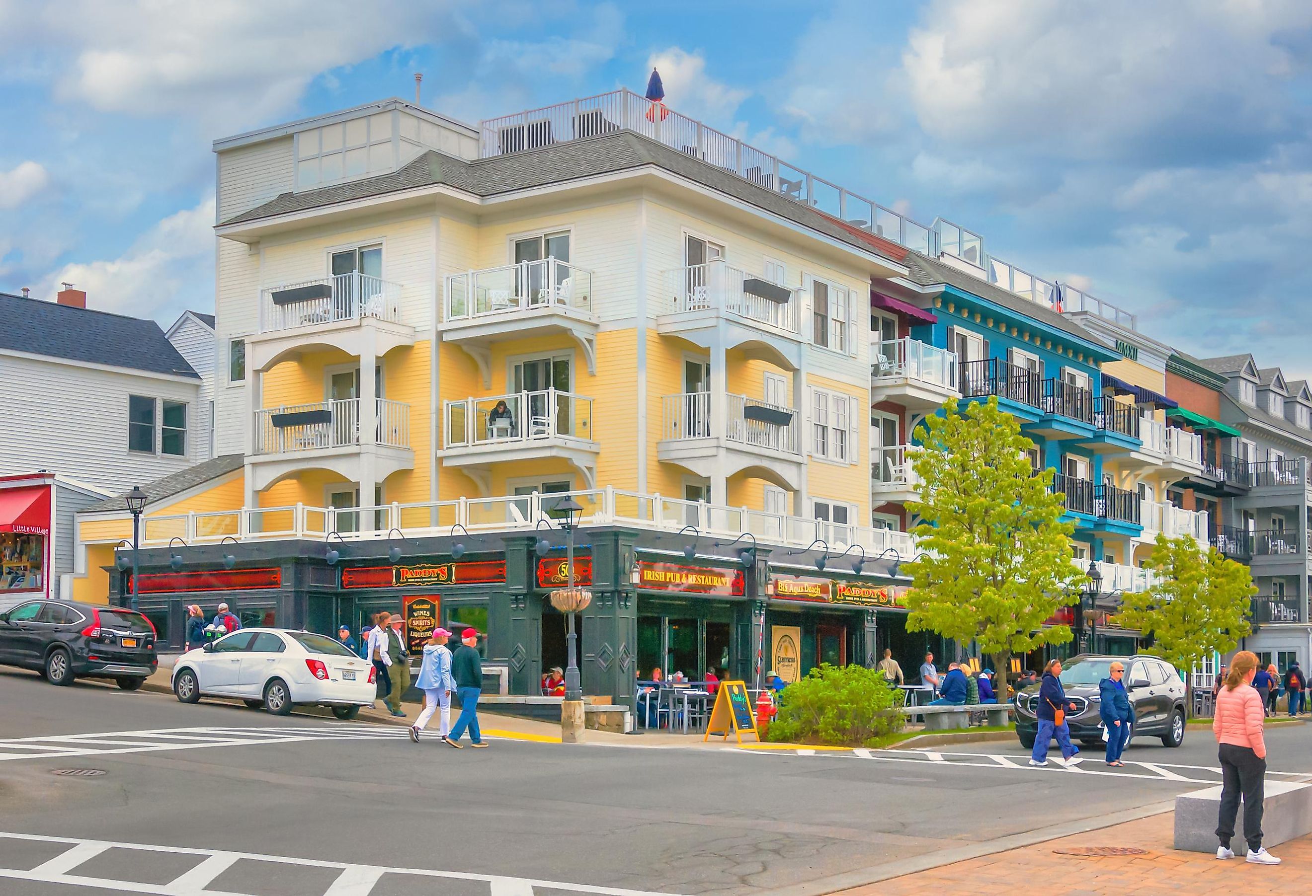 Tourists walk along the sidewalks outside the West Street Hotel in Bar Harbor, via KenWiedemann