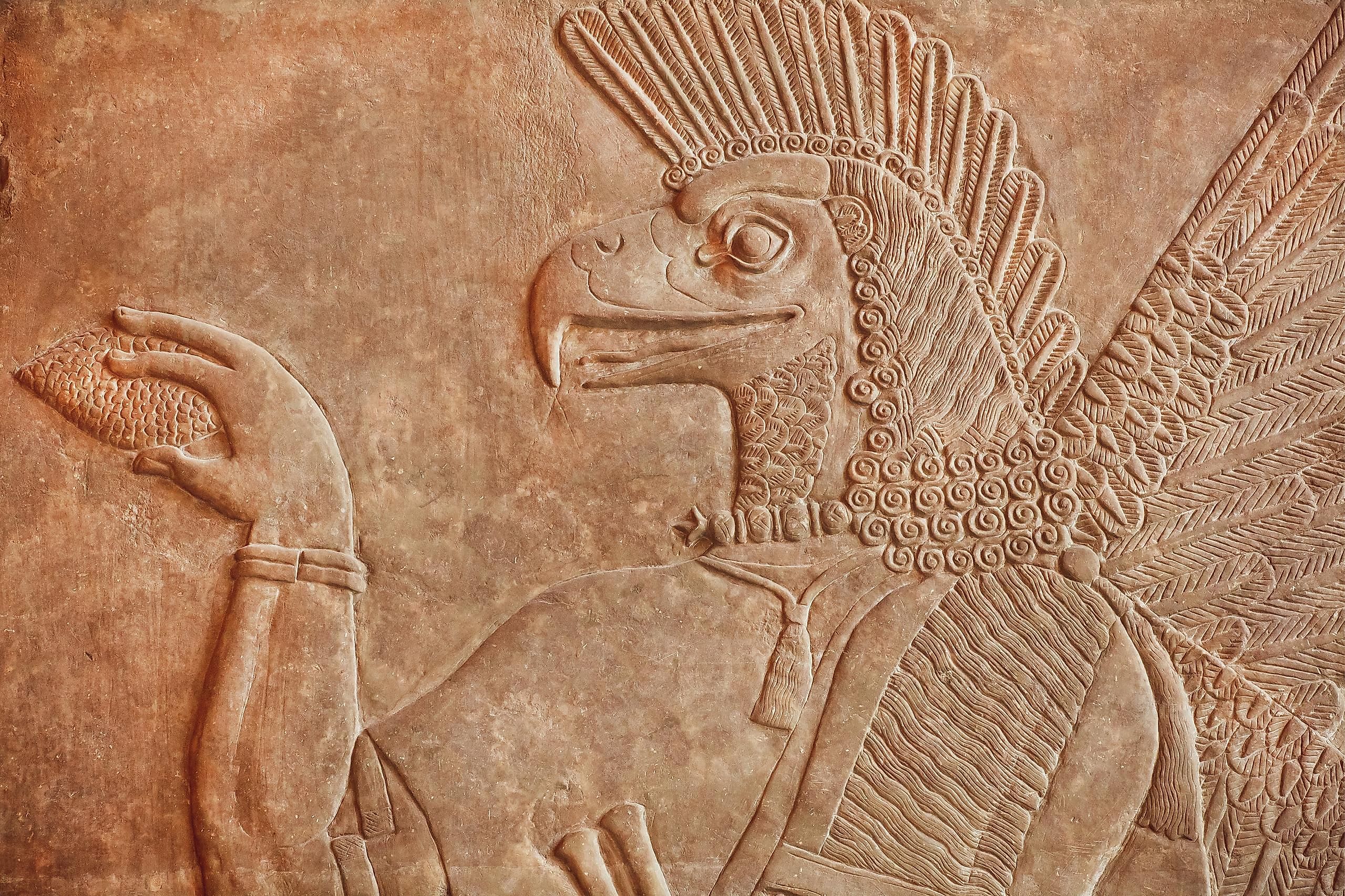 Ancient relief of an Assyrian mythological genie. Today, many Assyrian Christians have fled the Middle East due to religious persecution.