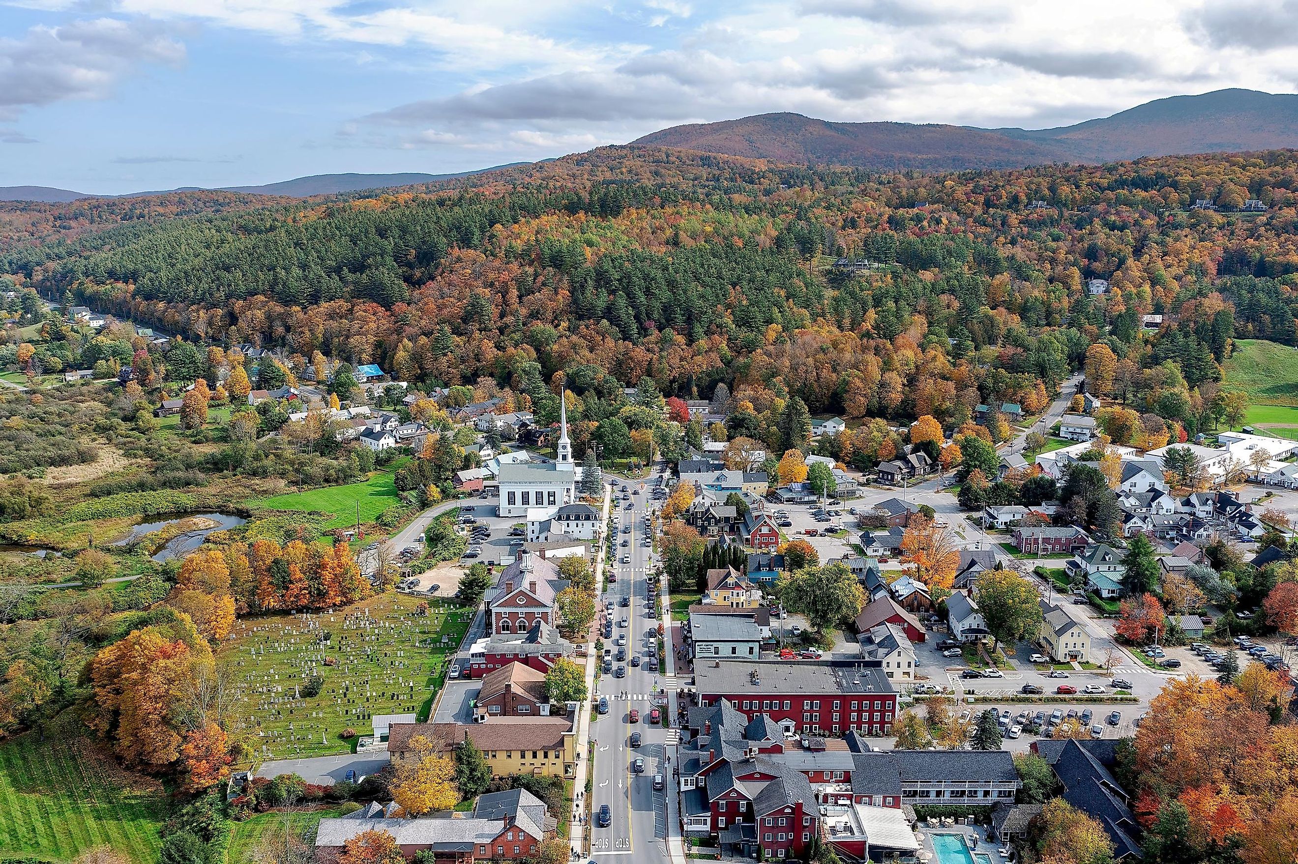 Aerial view of Stowe Vermont and the Green Mountains with autumn colors.