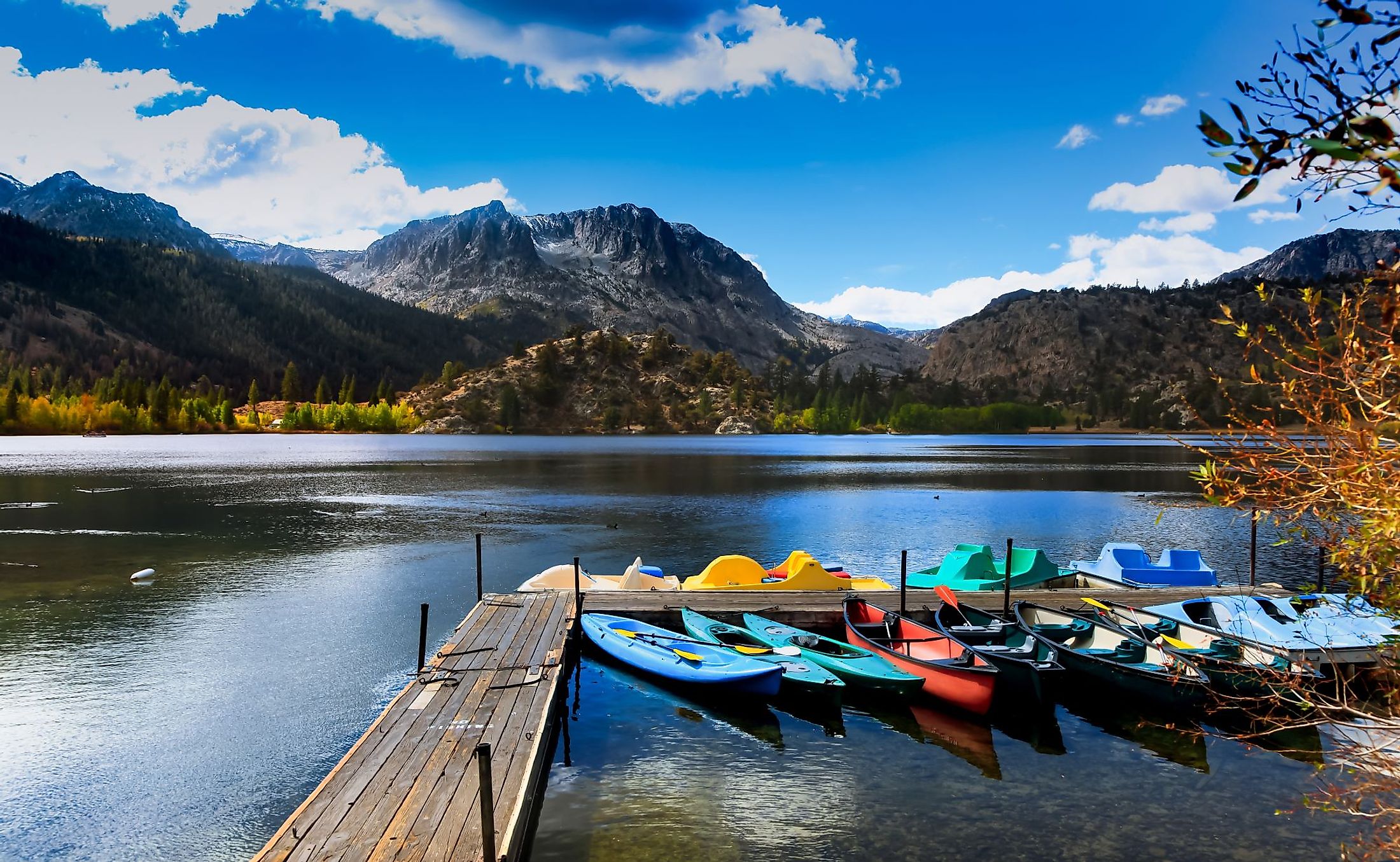 Colorful boats at Gull Lake marina in Eastern Sierra mountains, California. 