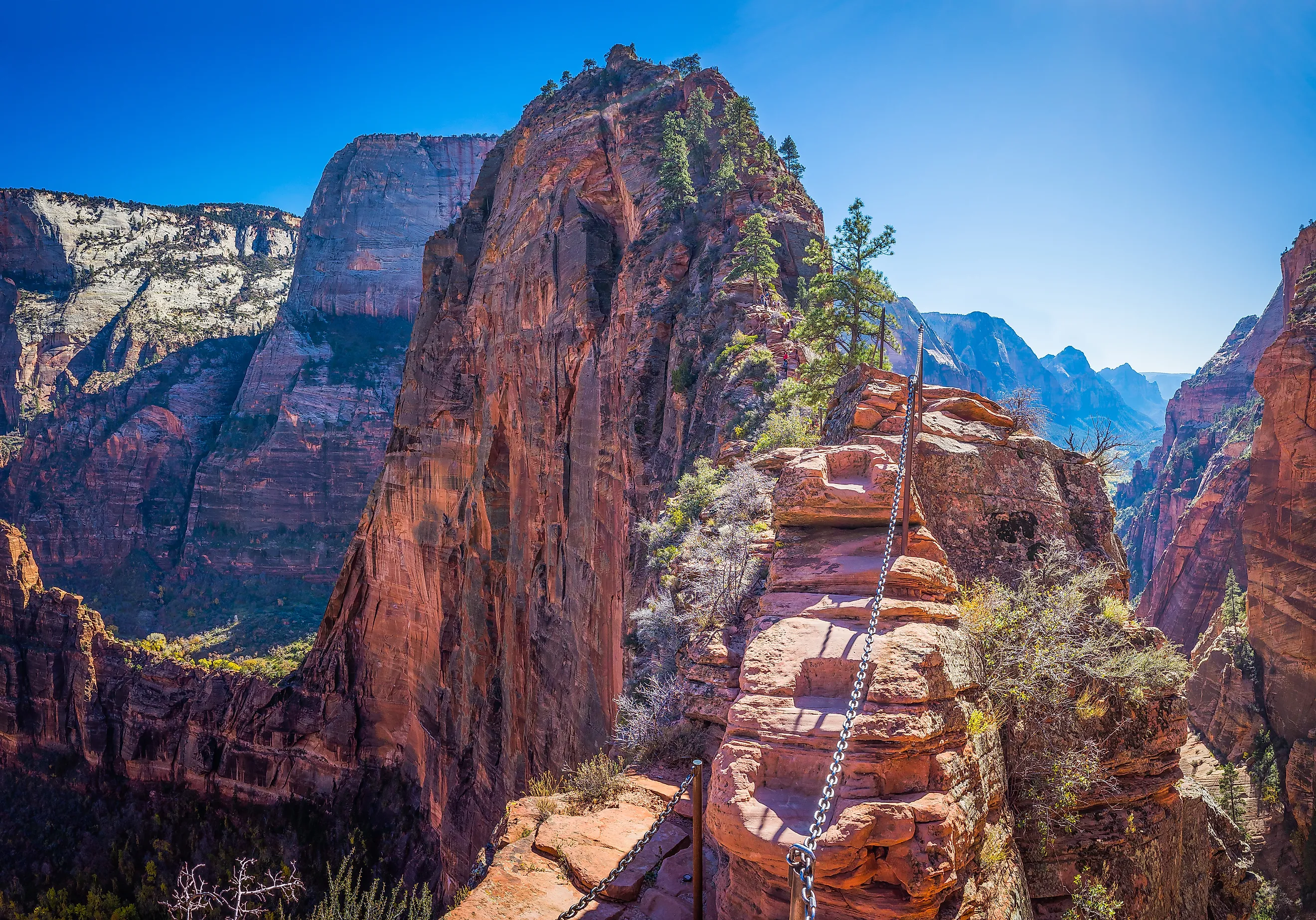 View from the narrow trail of Angel's Landing, the precipitous rocky ridge high above the canyon floor in Zion National Park, Utah, USA.