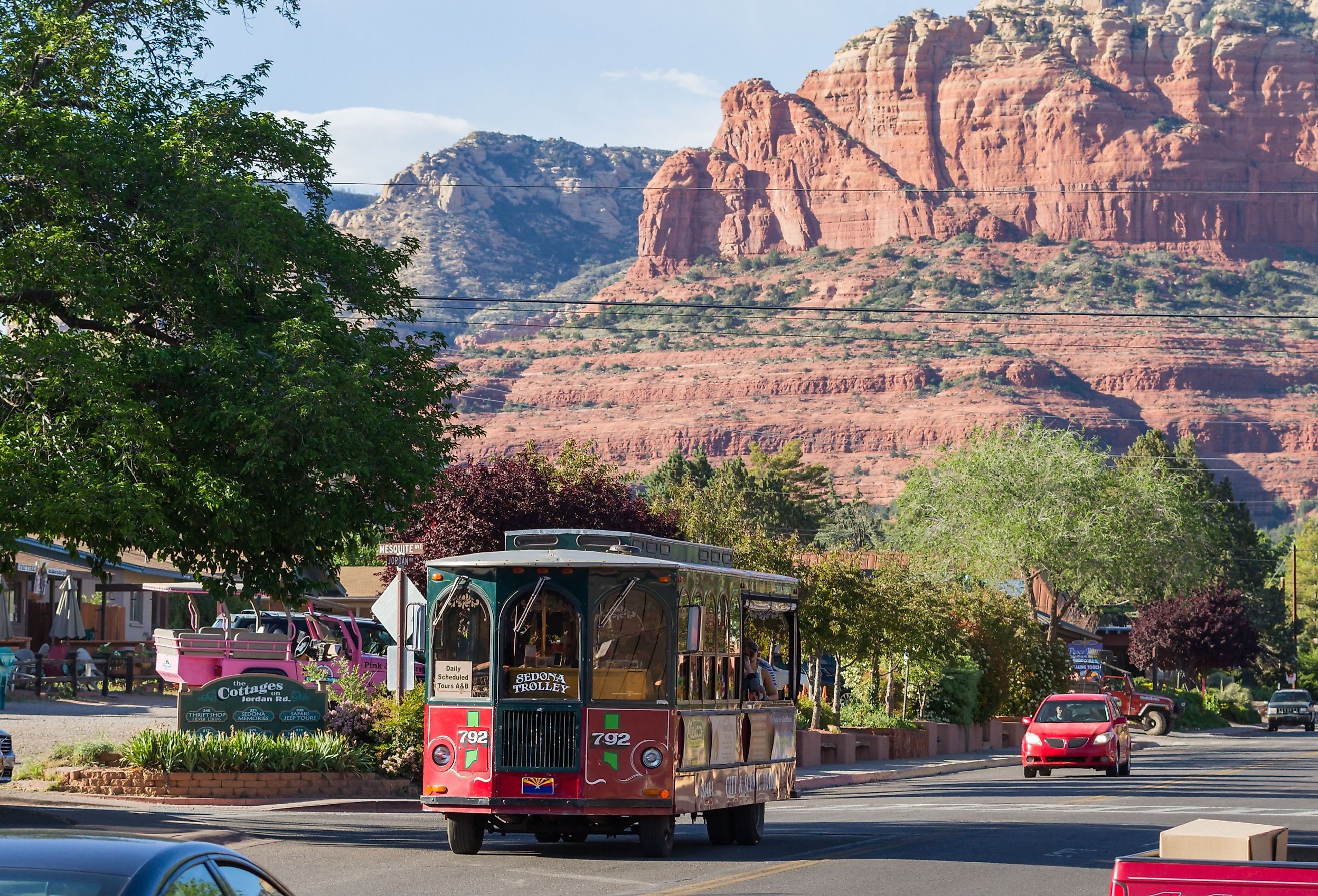 Sedona Trolley giving a tour of Sedona, Arizona and scenery, in spring. Image credit Wollertz via Shutterstock