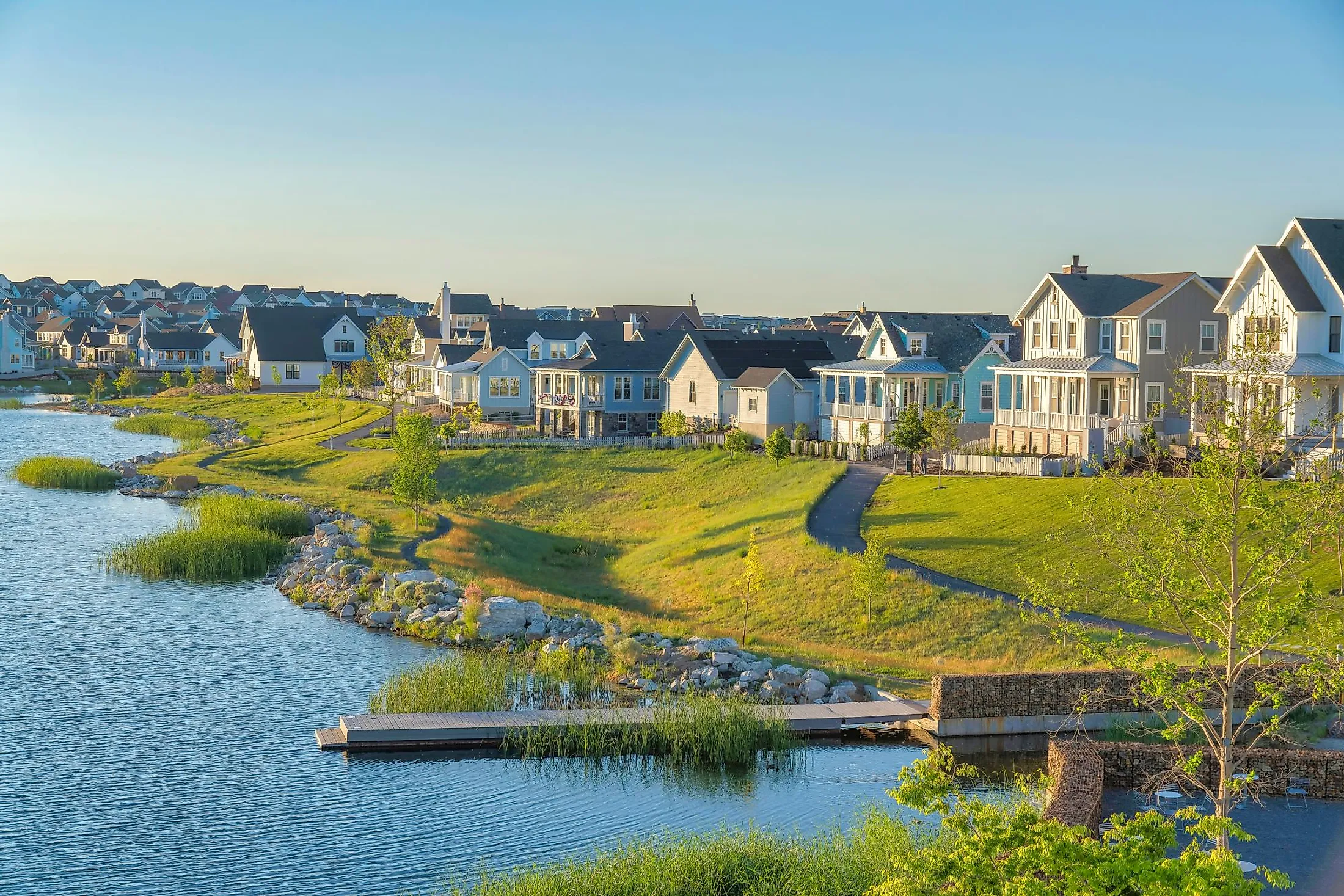 Residential houses at Daybreak in South Jordan, Utah, with Oquirrh Lake waterfront. 