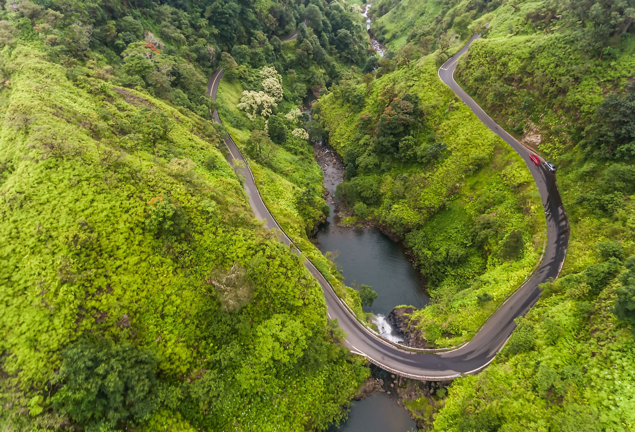 Aerial view of a waterfall on the road to Hana, Maui, Hawaii. Image credit Kelly Headrick via Shutterstock.