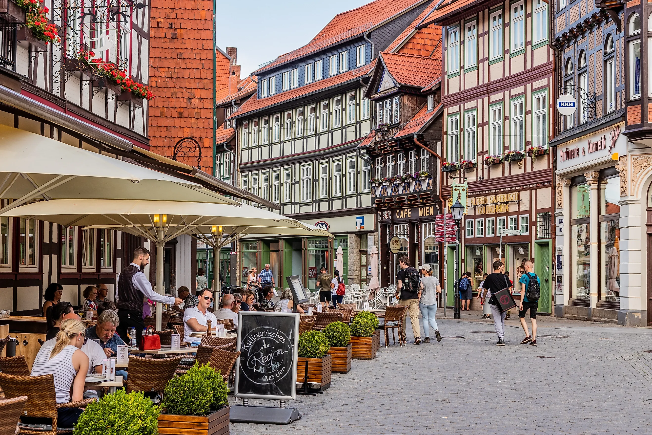 Street with a restaurant in old town Wernigerode, Germany.