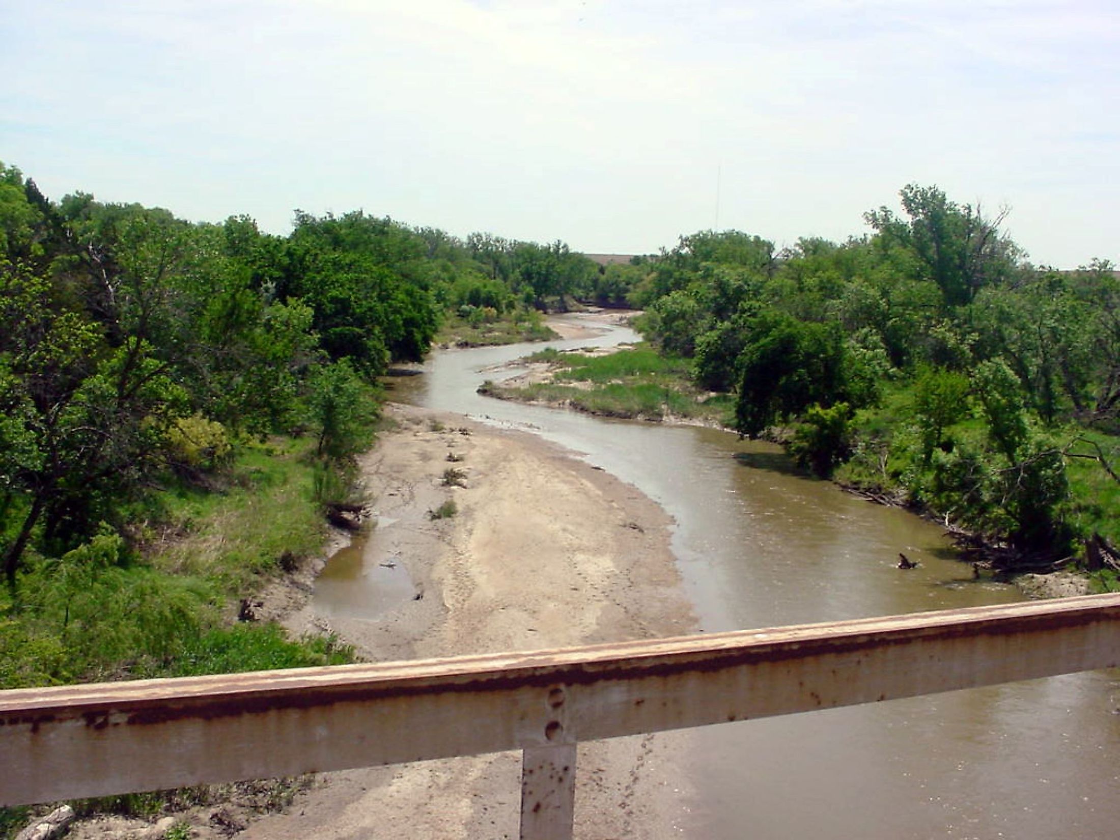 Photo of the Smoky Hill River from a stream gauge station near Assaria, Kansas. Image Credit: National Weather Service, Public domain, via Wikimedia Commons