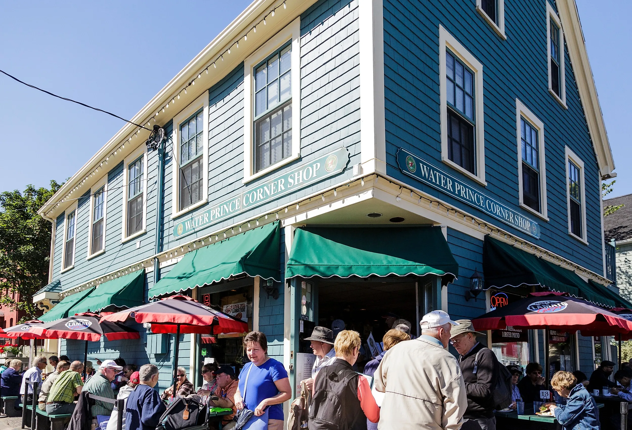 Folks dining al fresco at Water Prince Corner Shop in Charlottetown, PEI. Image credit Darryl Brooks via Shutterstock.