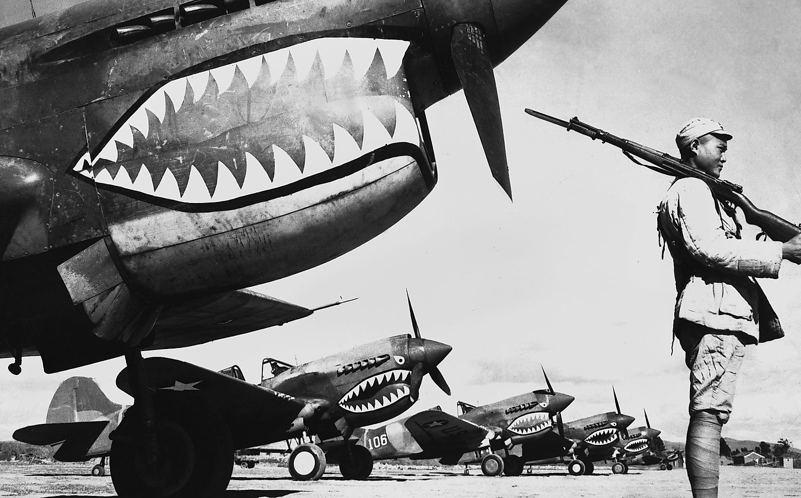 Chinese soldiers protect American planes in World War II.