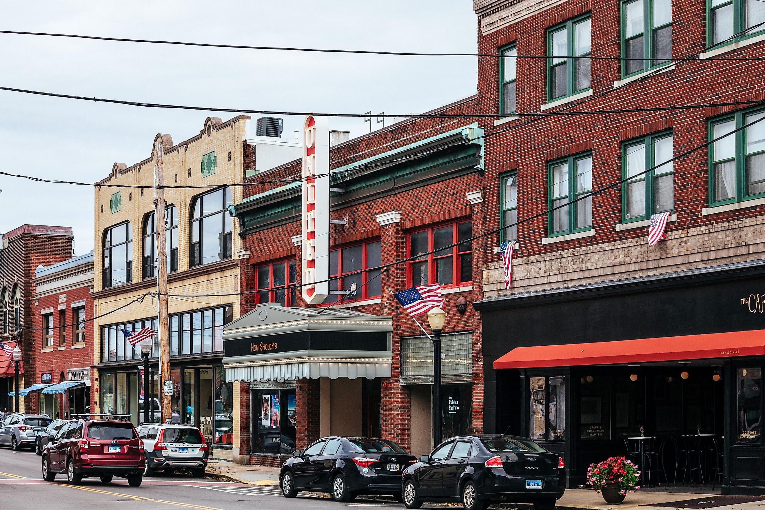 Westerly, Rhode Island: High Street with colourful buildings and a few people. via peeterv / iStock.com