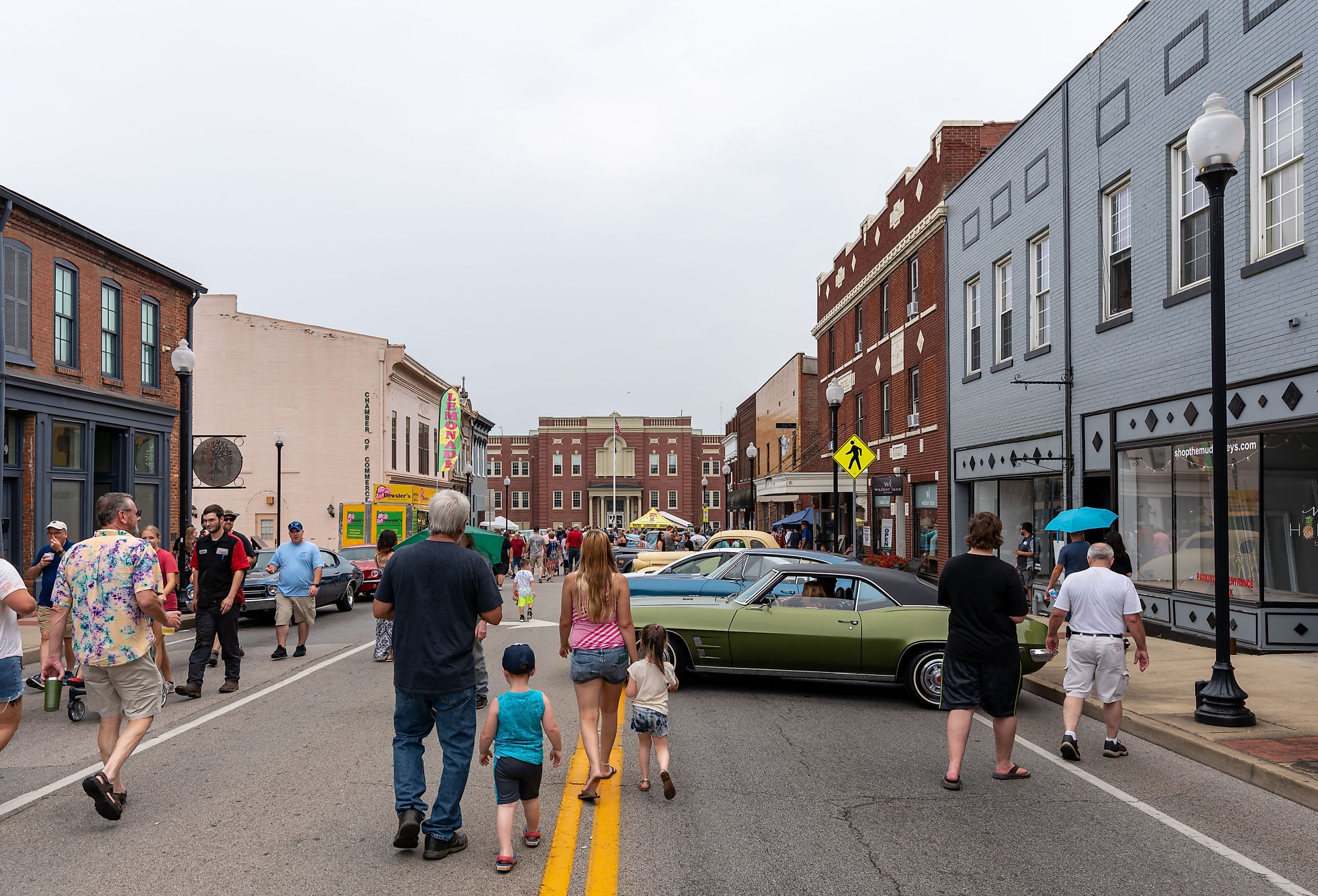 Spectators with cars on display during the Cruisin' The Heartland 2021 car show in downtown Elizabethtown.
