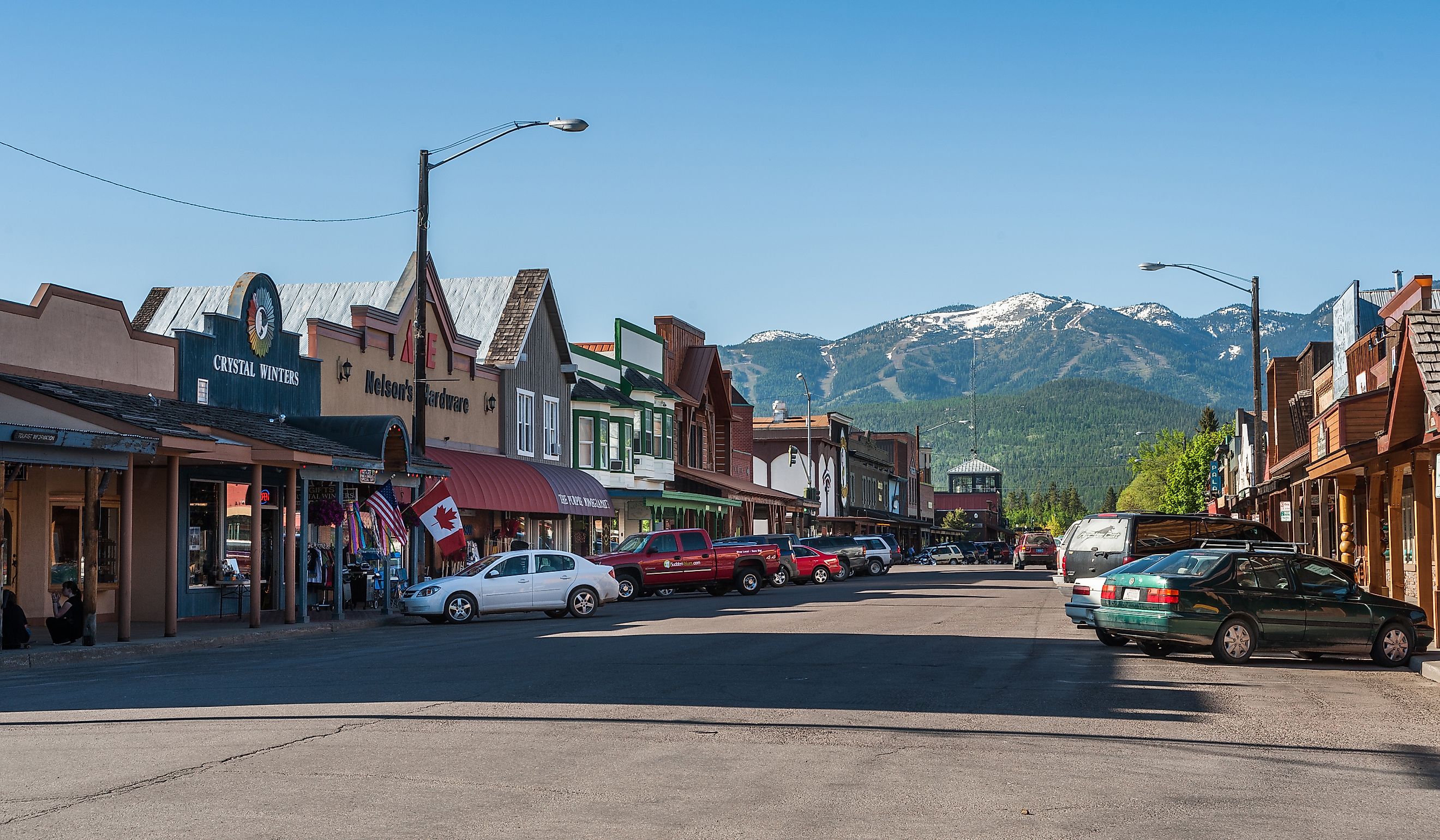 Downtown Whitefish Montana with the ski resort in the distance. (Editorial credit: Beeldtype / Shutterstock.com)