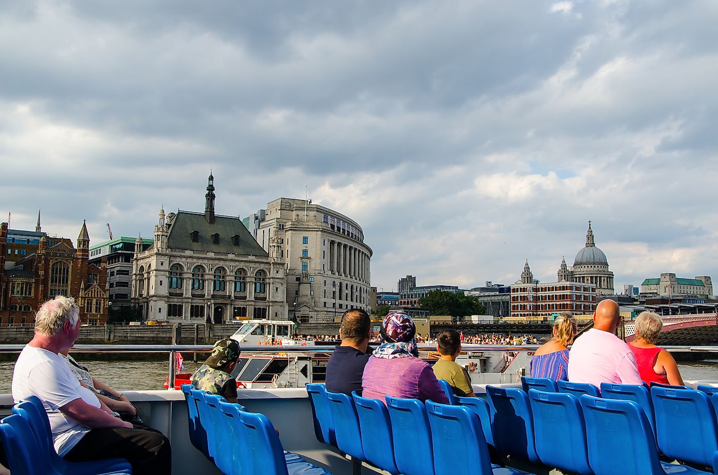 Tourists cruising on the River Thames.