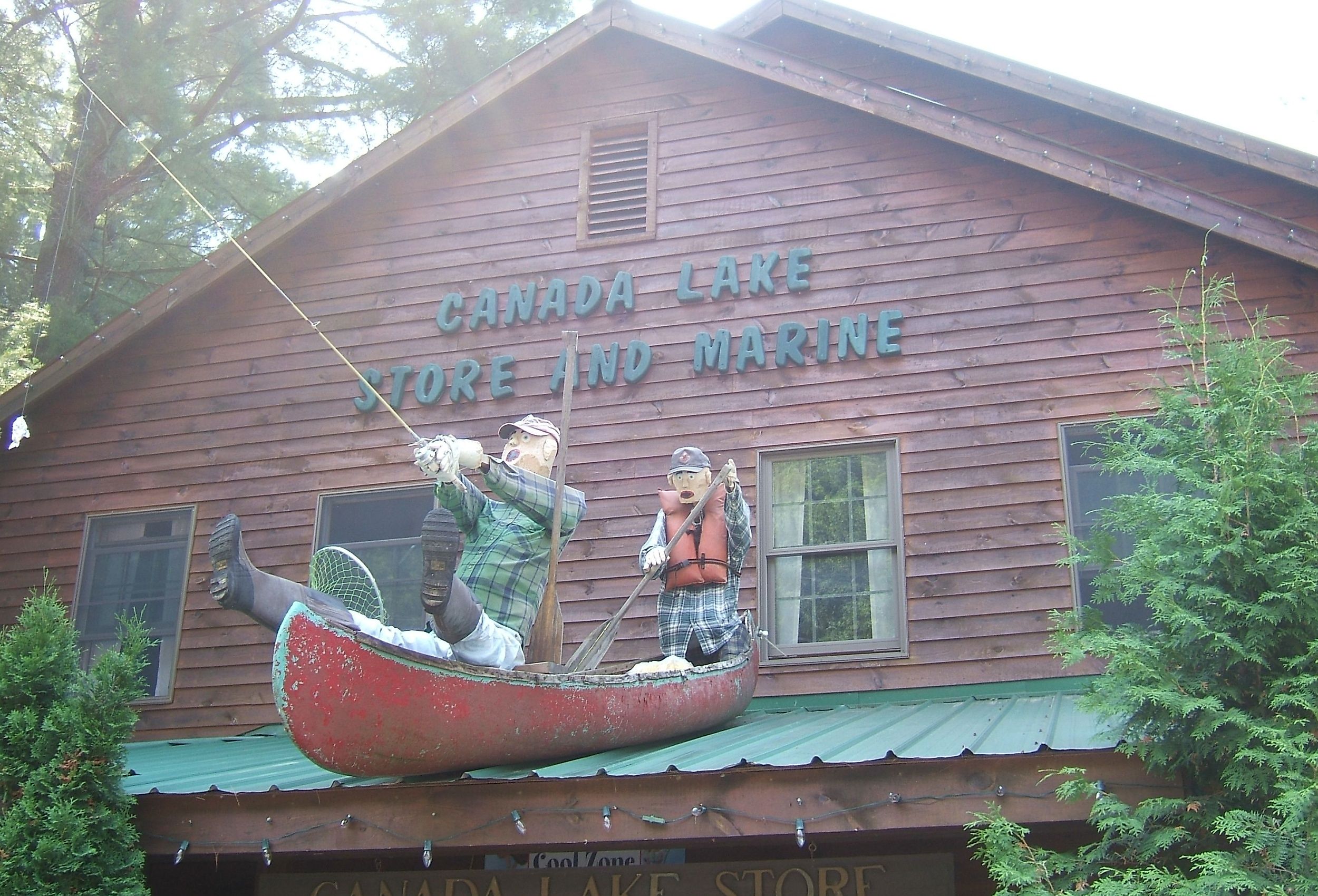 Exterior of Canada Lake Store and Marine in Long Lake, NY. Image credit Michael LaMonica via Shutterstock.