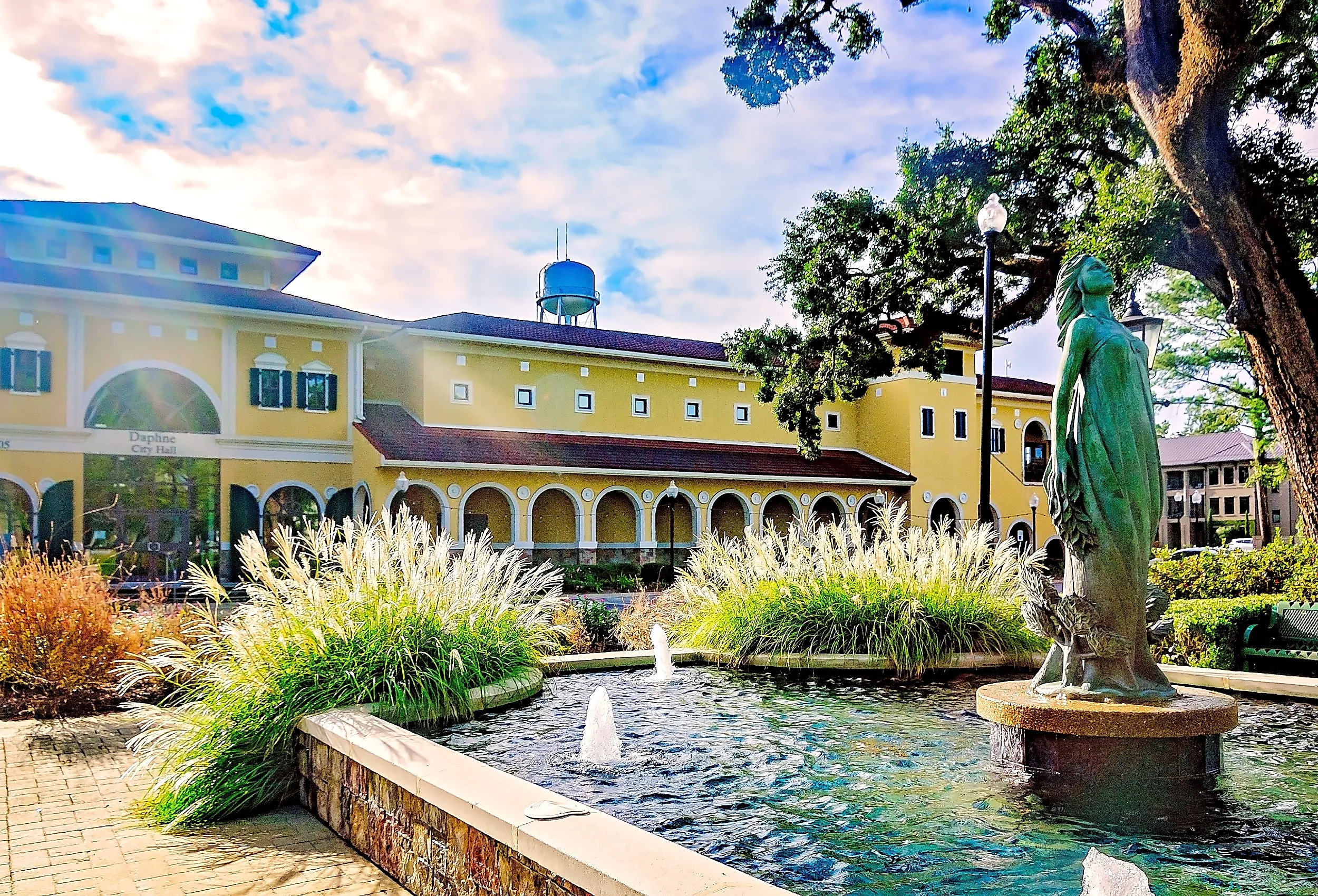 A statue of Daphne, a naiad in Greek mythology, stands in front of Daphne City Hall in Daphne, Alabama. Image credit Carmen K. Sisson via Shutterstock