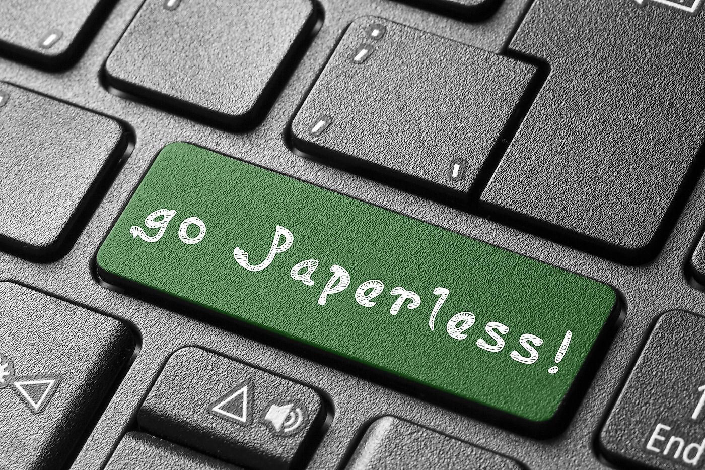 Go Paperless. Image credit: Cagla Acikgoz/Shutterstock.com
