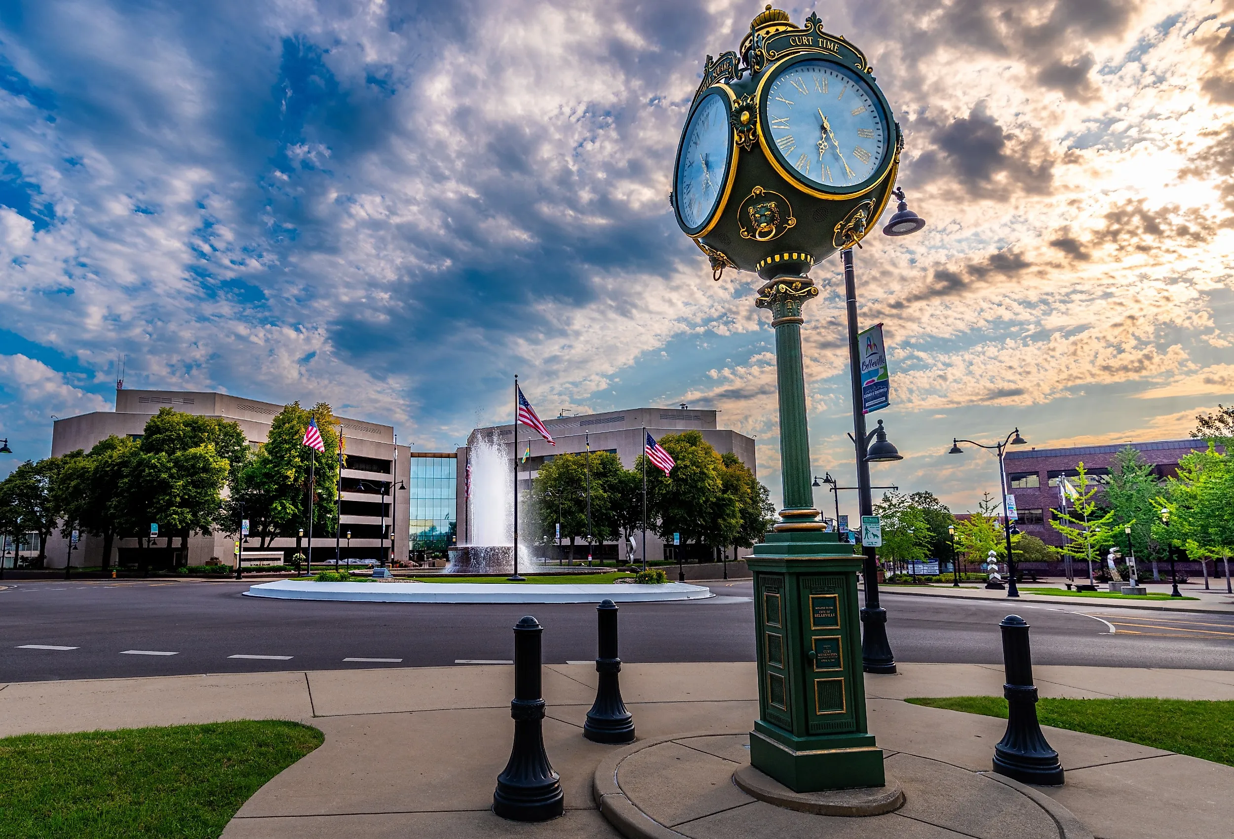 “Curt Time” memorial clock and central fountain in front of St. Clair Country Building, Belleville, Illinois. Image credit RozenskiP via Shutterstock