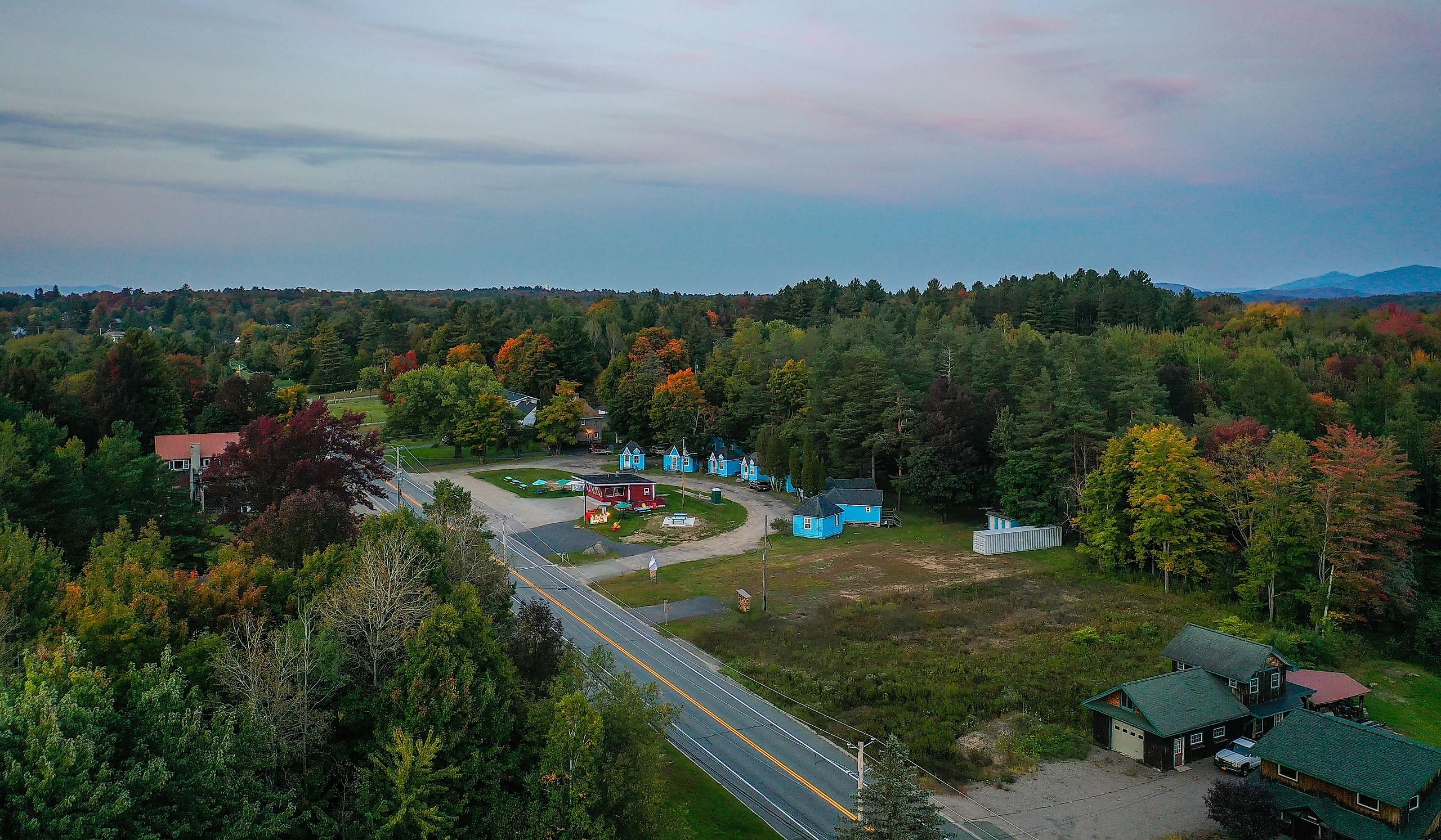 Sunset over Tupper Lake NY Adirondacks in early fall aerial