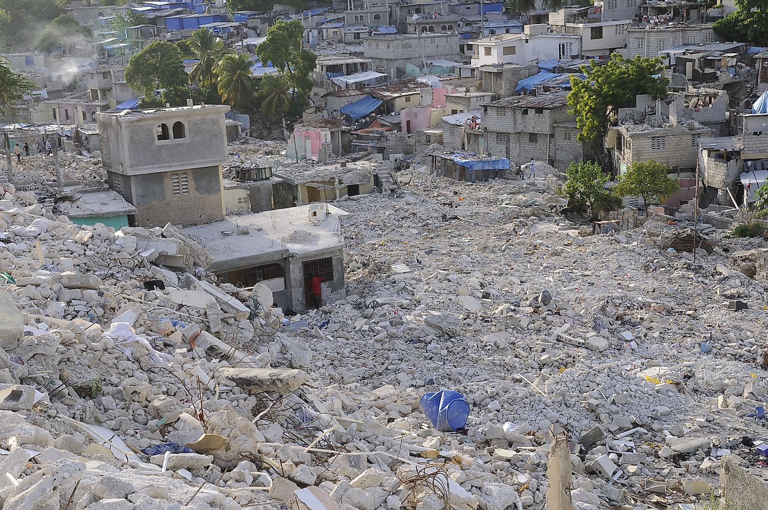 A valley of broken houses and debris on August 28, 2010 in Port-Au-prince, Haiti. Image credit: Arindambanerjee/Shutterstock.com