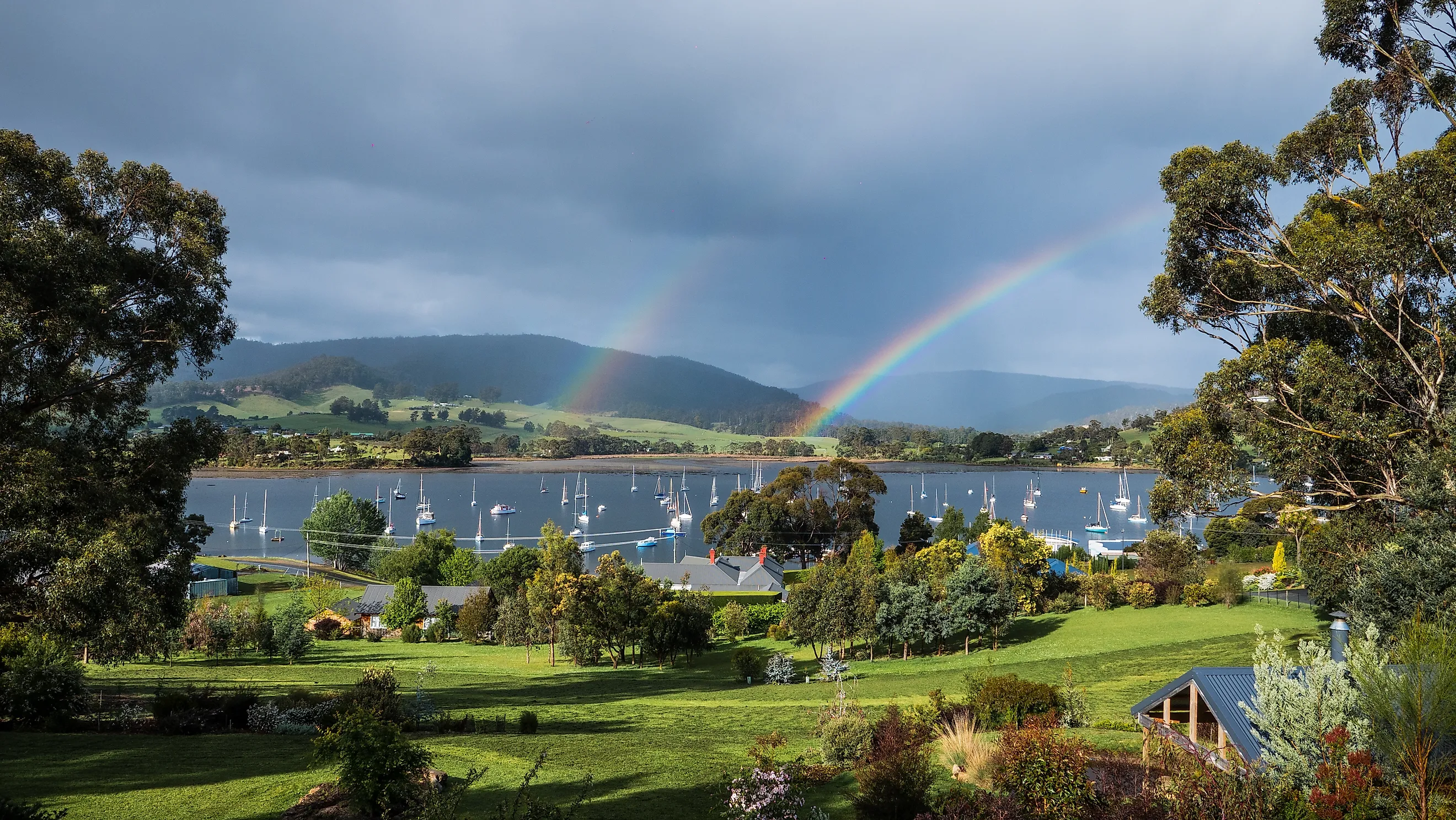 Double rainbow over the marina in Cygnet, Tasmania, Australia.