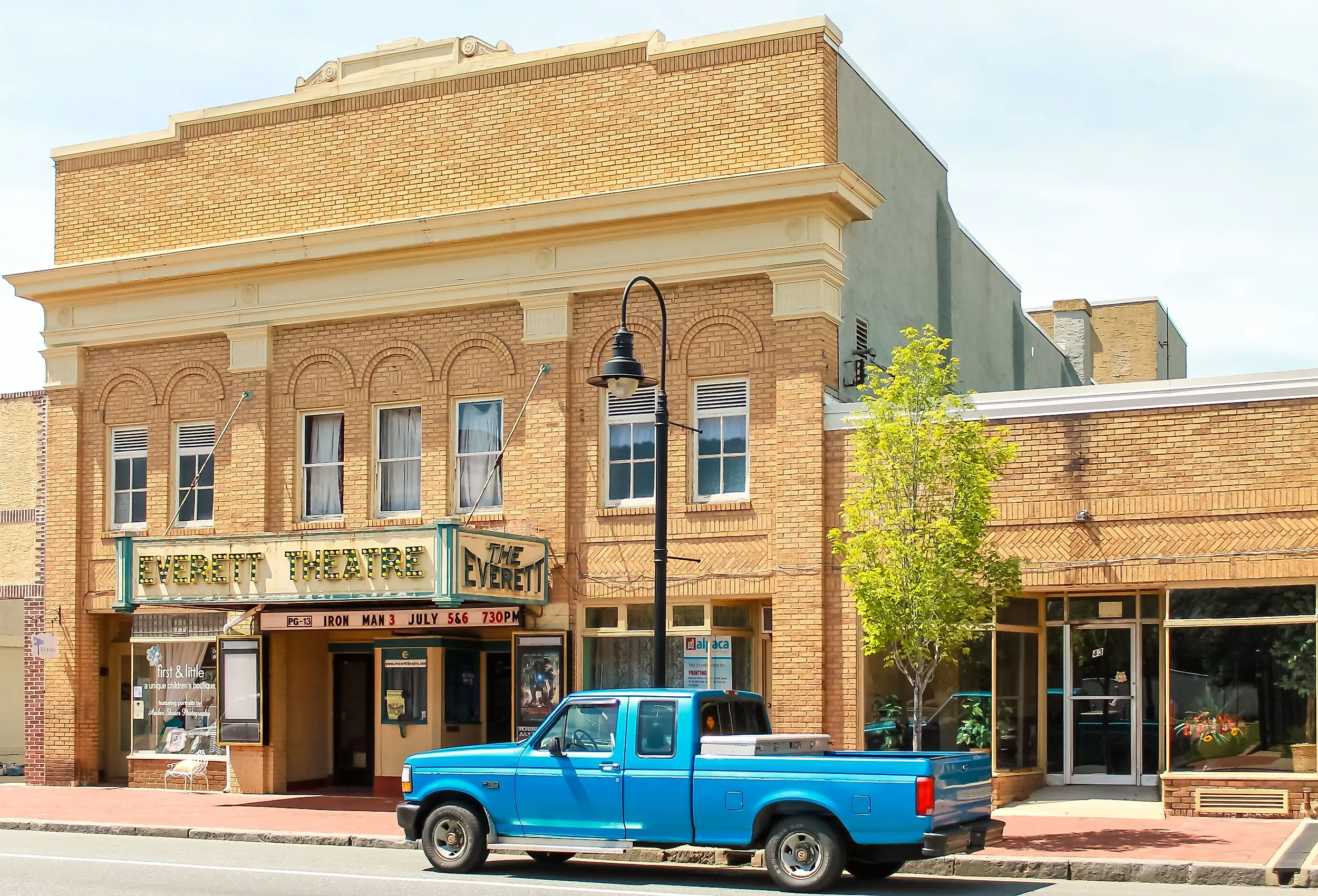Blue pick-up truck on the street in front of the Everett Theatre in Middletown, Delaware. Editorial credit: Alexanderphoto7 / Shutterstock.com