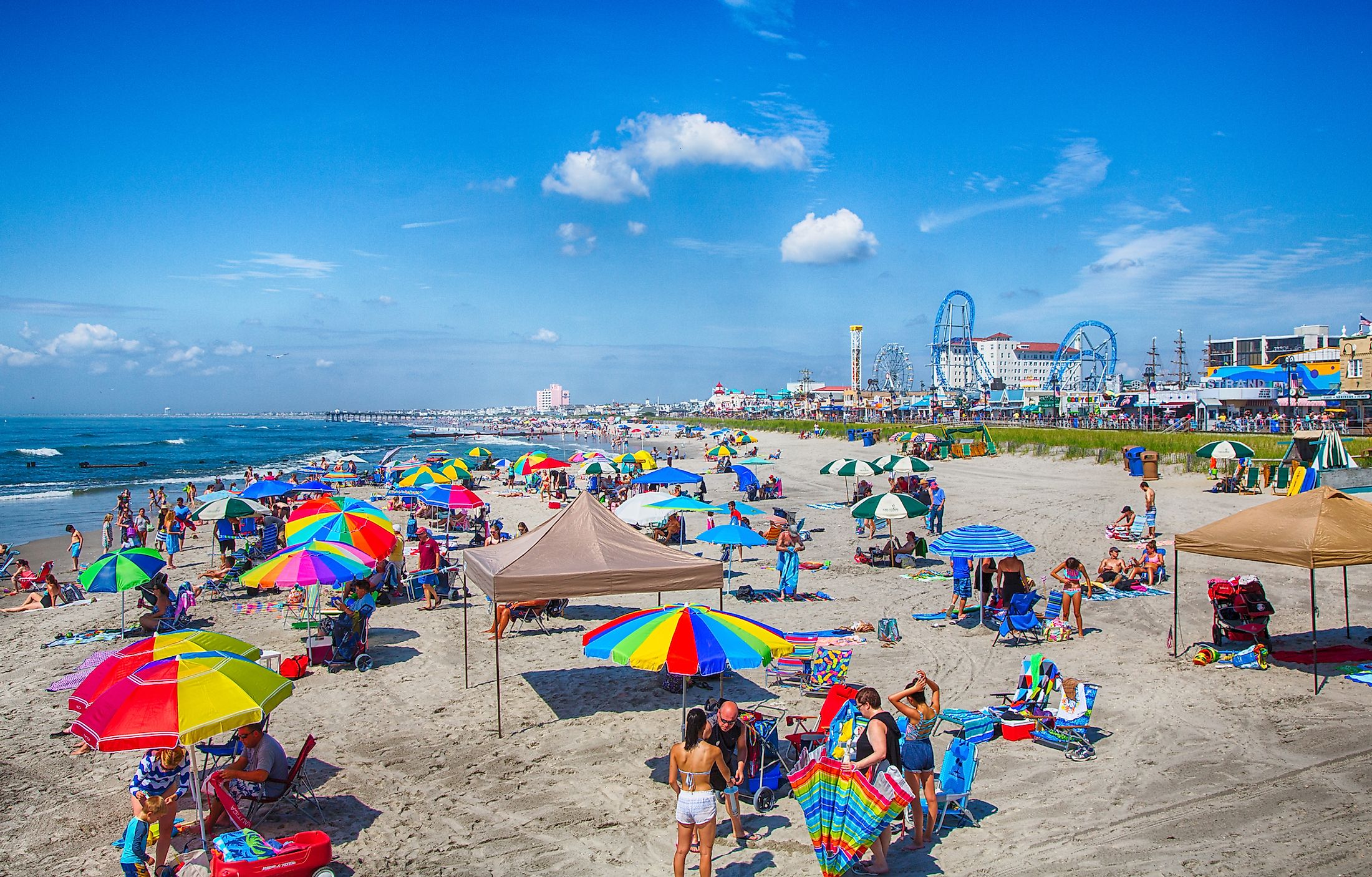 Vacationers enjoy the sun and sand in Ocean City. Editorial credit: Gary C. Tognoni / Shutterstock.com