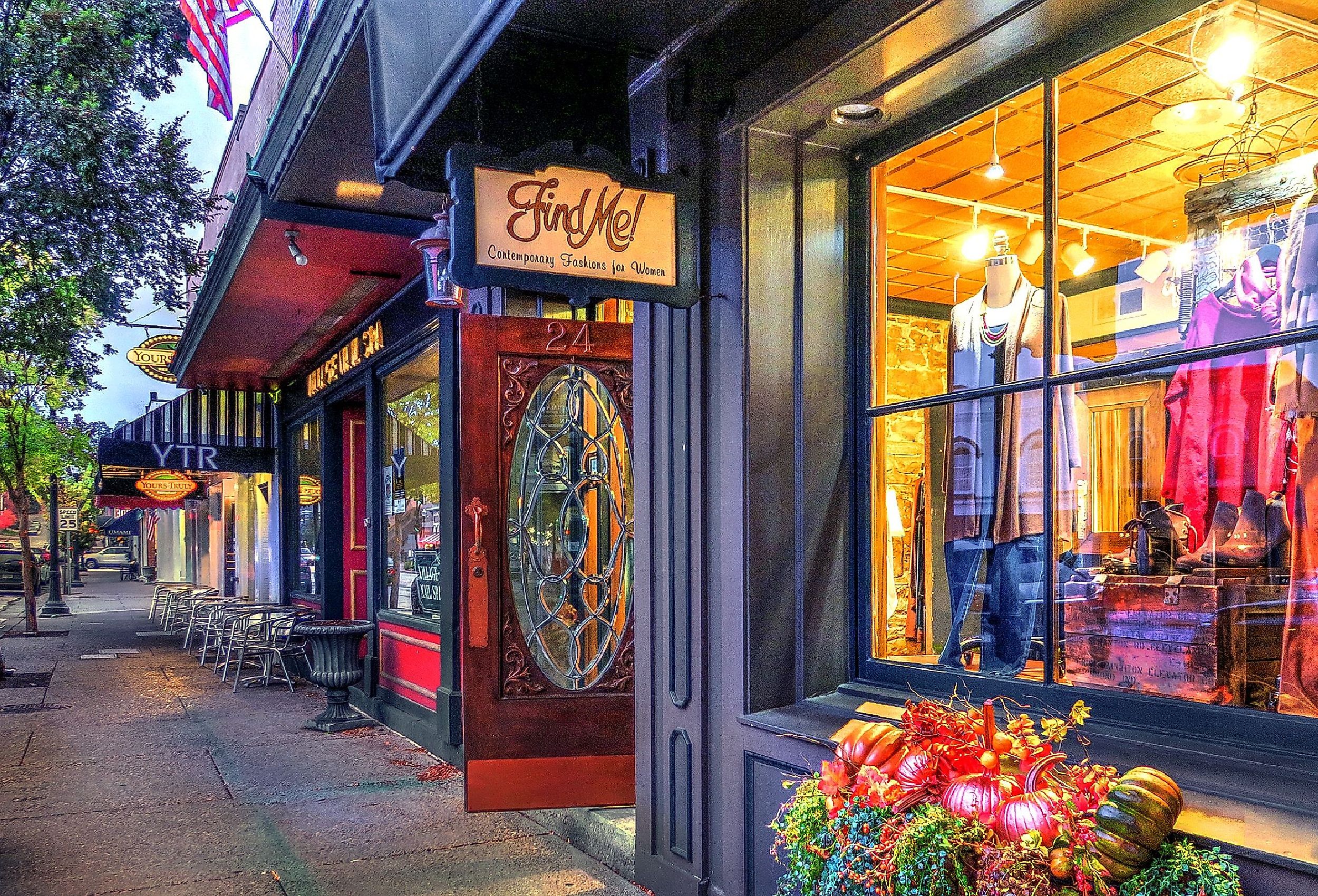 Sidewalk view of Main Street with quaint upscale shops in the historic village of Chagrin Falls, Ohio. Image credit Lynne Neuman via Shutterstock.