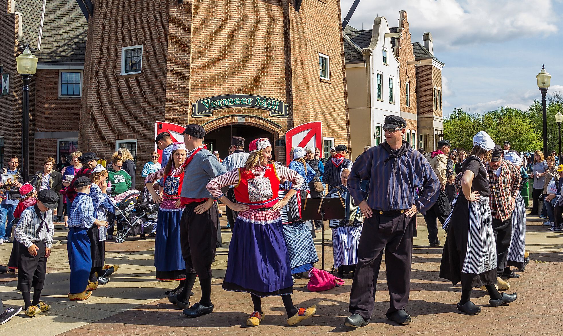 A Dutch folk dance performance in traditional costume.