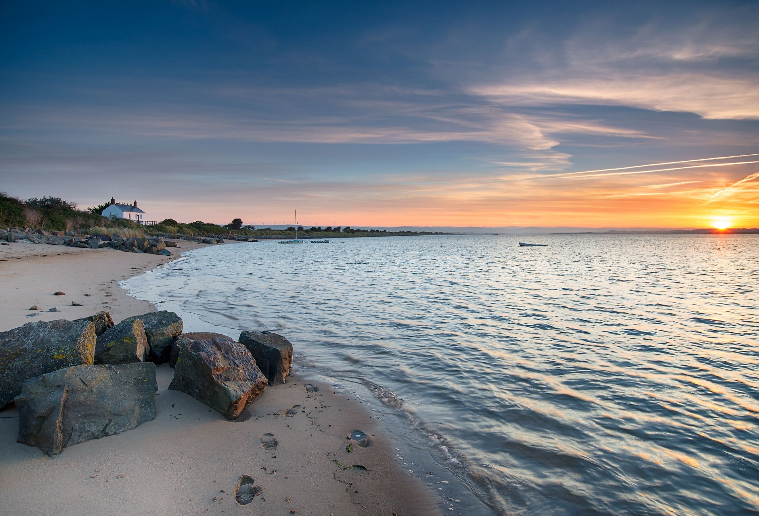 Beautiful sunrise over the beach at Crow Point near Barnstaple on the north coast of Devon. Image credit Helen Hotson via Shutterstock. 