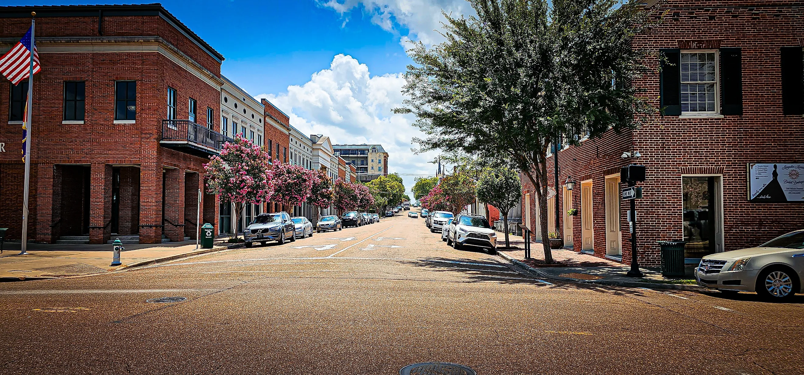 The Main Street lined with brick buildings in Natchez, Mississippi. Editorial credit: VioletSkyAdventures / Shutterstock.com