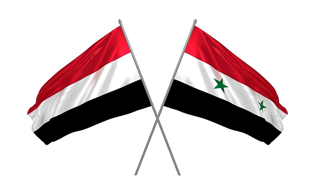 The flag of Yemen, left, and the flag of Syria.