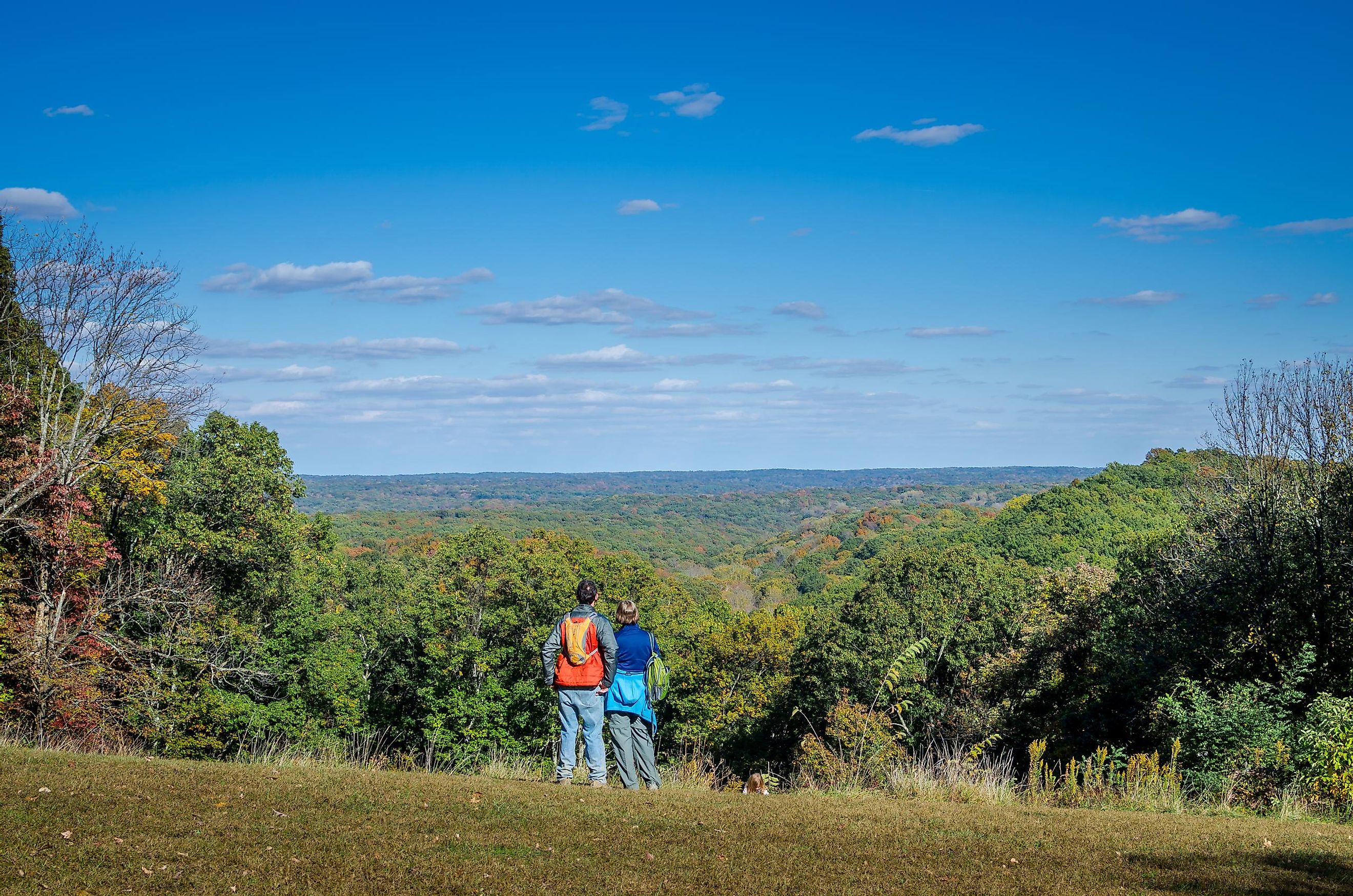 Hikers admiring the scenery at Brown County State Park in fall.