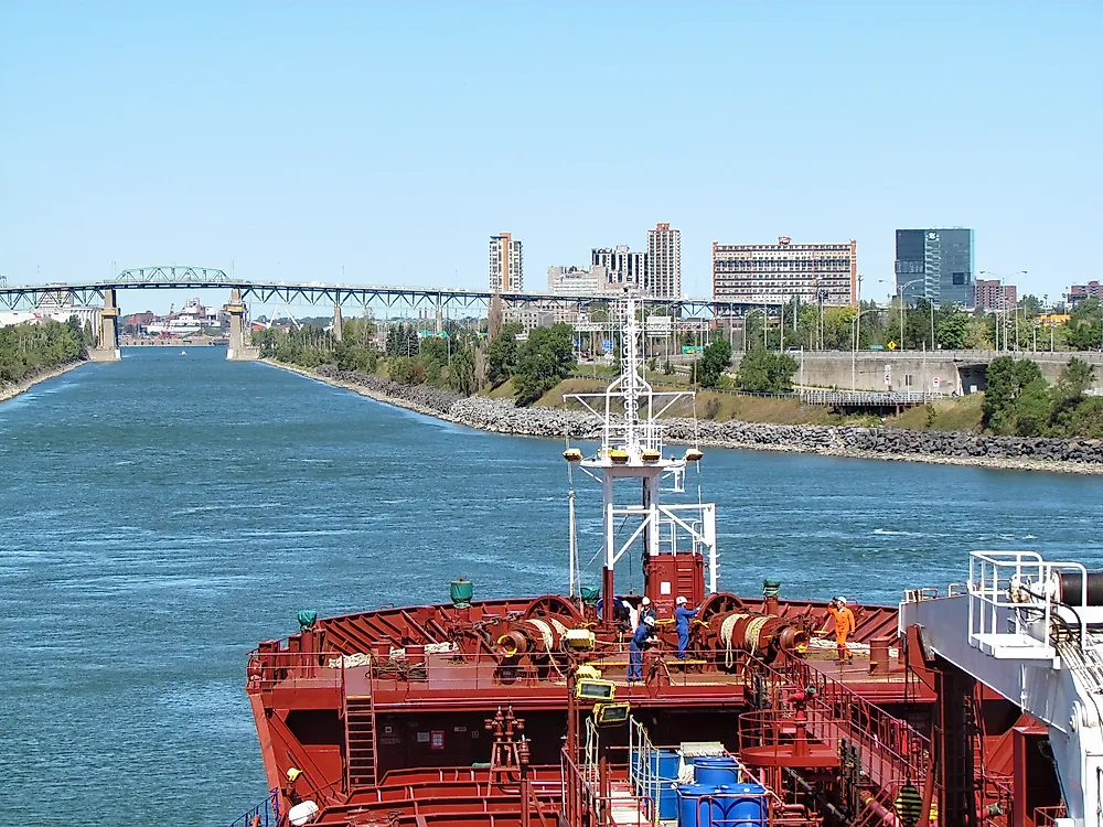 Tanker ship passing through Saint Lawrence Seaway near Montreal, Quebec, Canada. Editorial credit: eWilding / Shutterstock.com