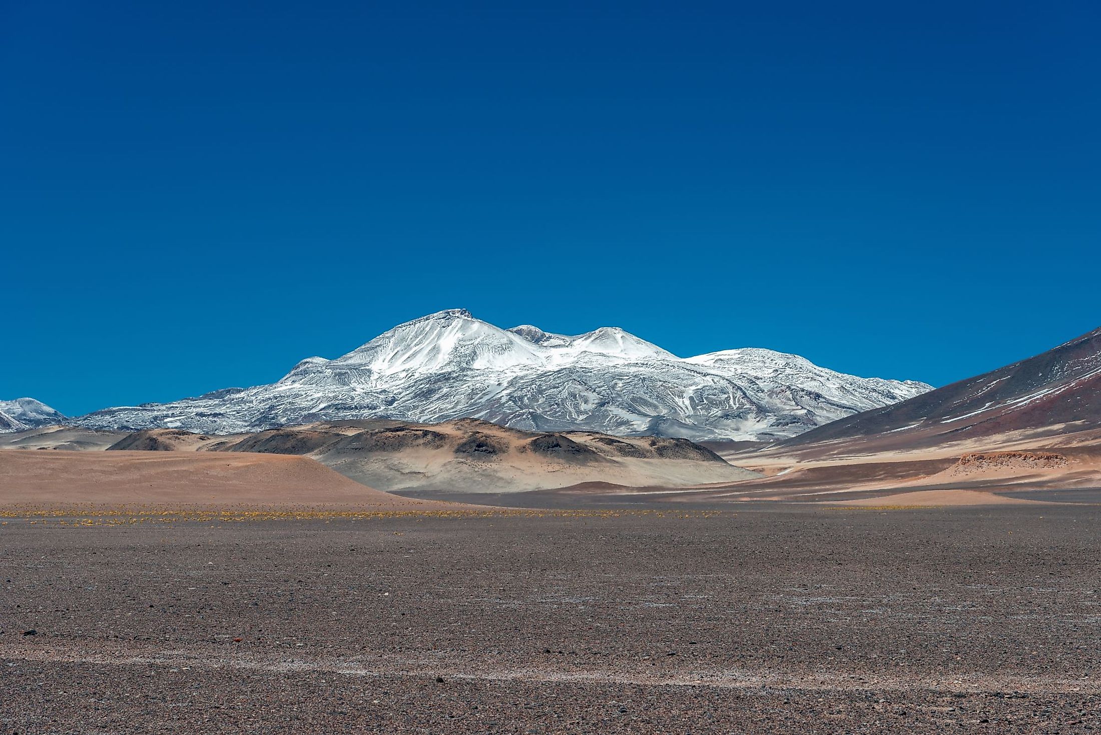 A view of Nevado Ojos del Salado - the world's highest active stratovolcano in Atacama Desert. 