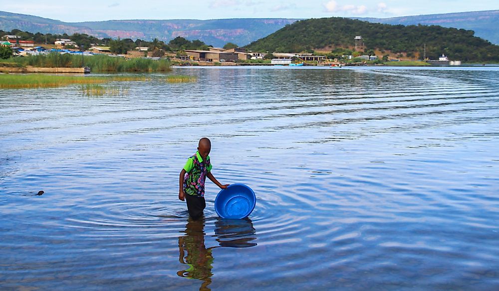 Lake Tanganyika holds the largest volume of freshwater in Africa. Editorial credit: Tatsiana Hendzel / Shutterstock.com