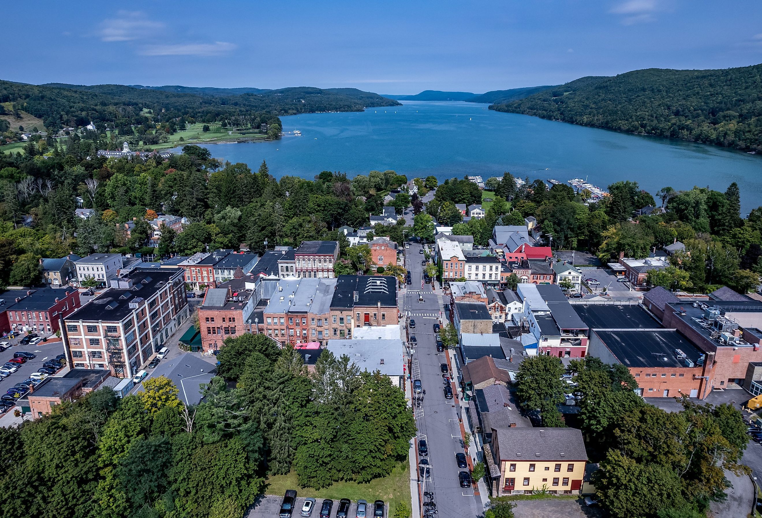 Aerial view of Cooperstown, New York with the water in the background.