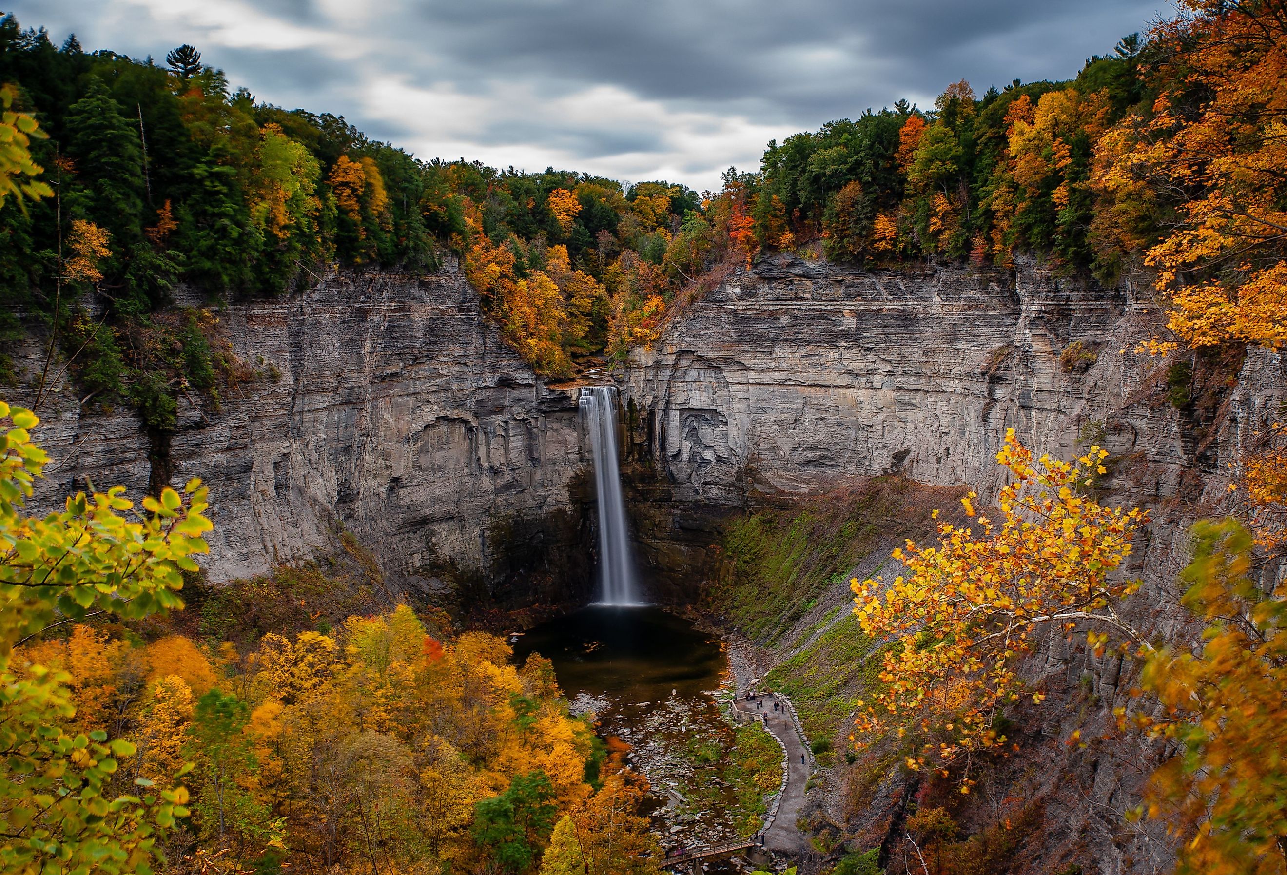 A scenic, autumn view of Taughannock Falls at Taughannock Falls State Park near Ithaca, New York.