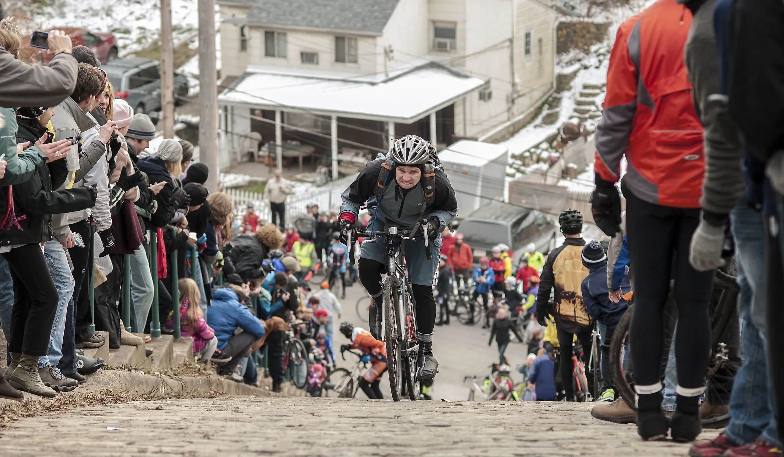  Riders struggle to make it to the top of Canton Avenue in Pittsburgh, one of the steepest residential street in the world. Editorial credit: jefftakespics2 / Shutterstock.com