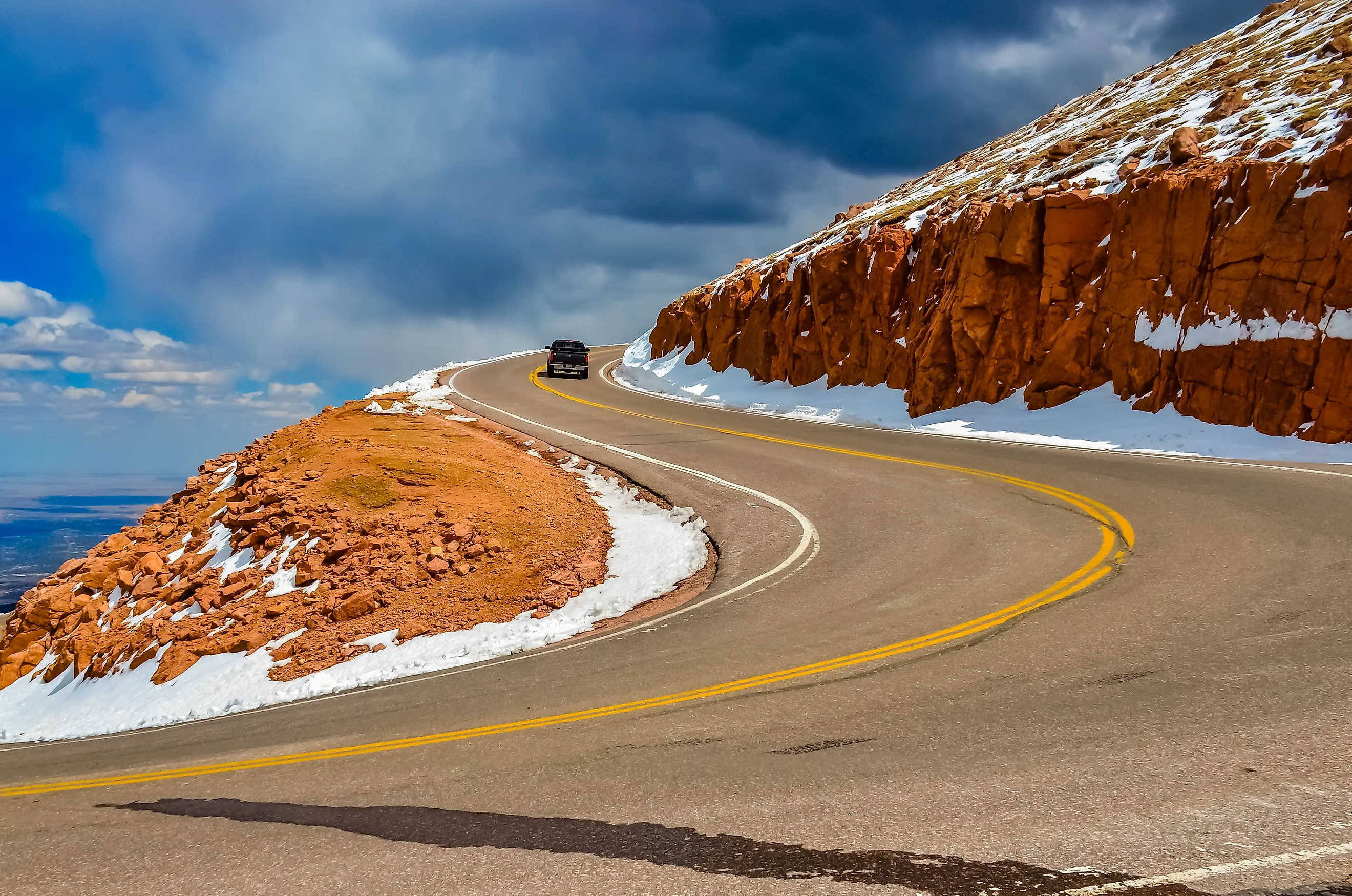 The road to the snow-covered mountain Pikes Peak, Colorado