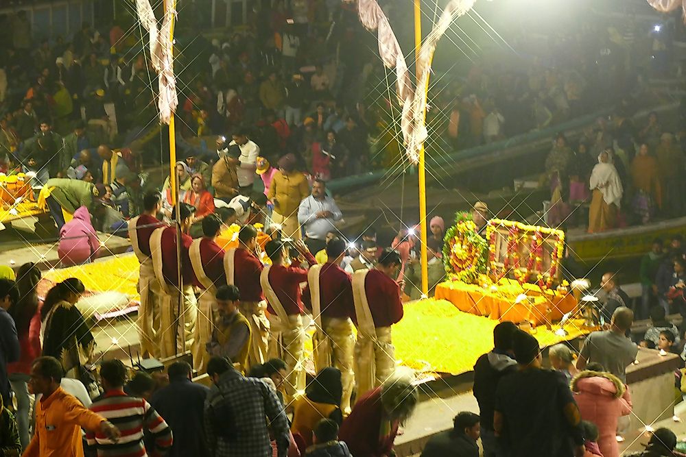 Brahmin priests conduct the aarti evening prayer service.