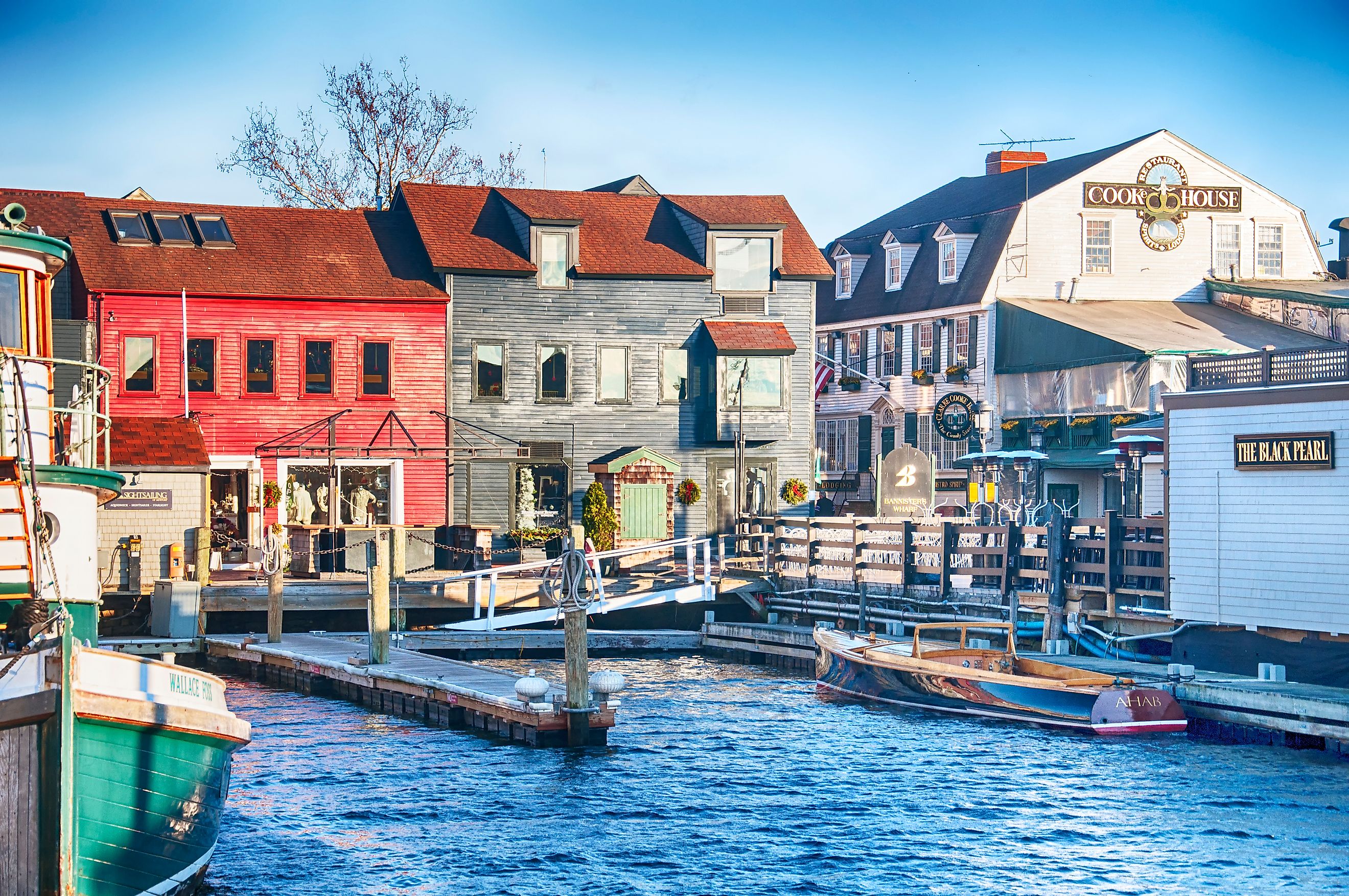 Boats and businesses along the harbor in Newport, Rhode Island. Editorial credit: Dan Hanscom / Shutterstock.com