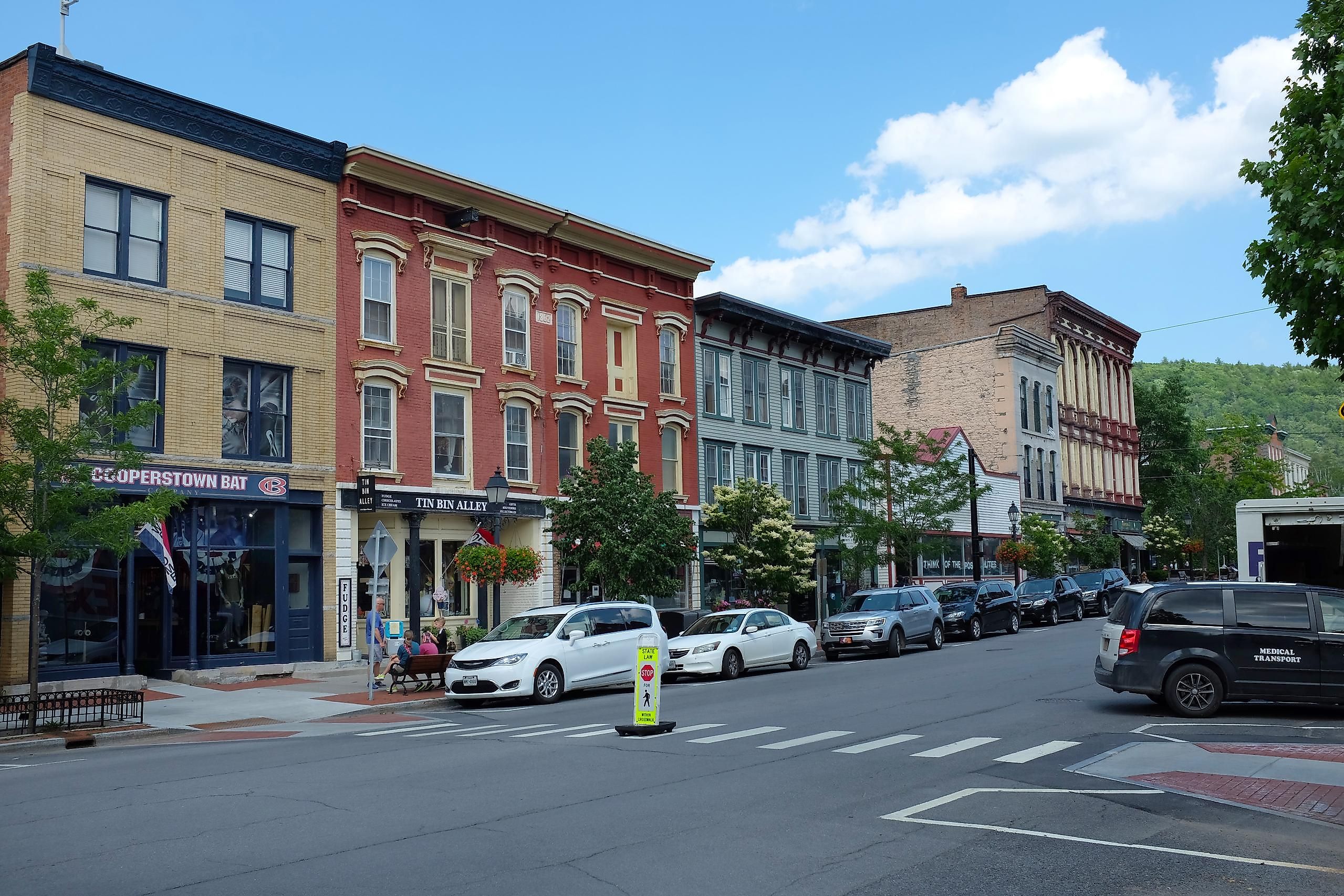 Main Street lined with colorful buildings in Cooperstown, New York. Editorial credit: Steve Cukrov / Shutterstock.com