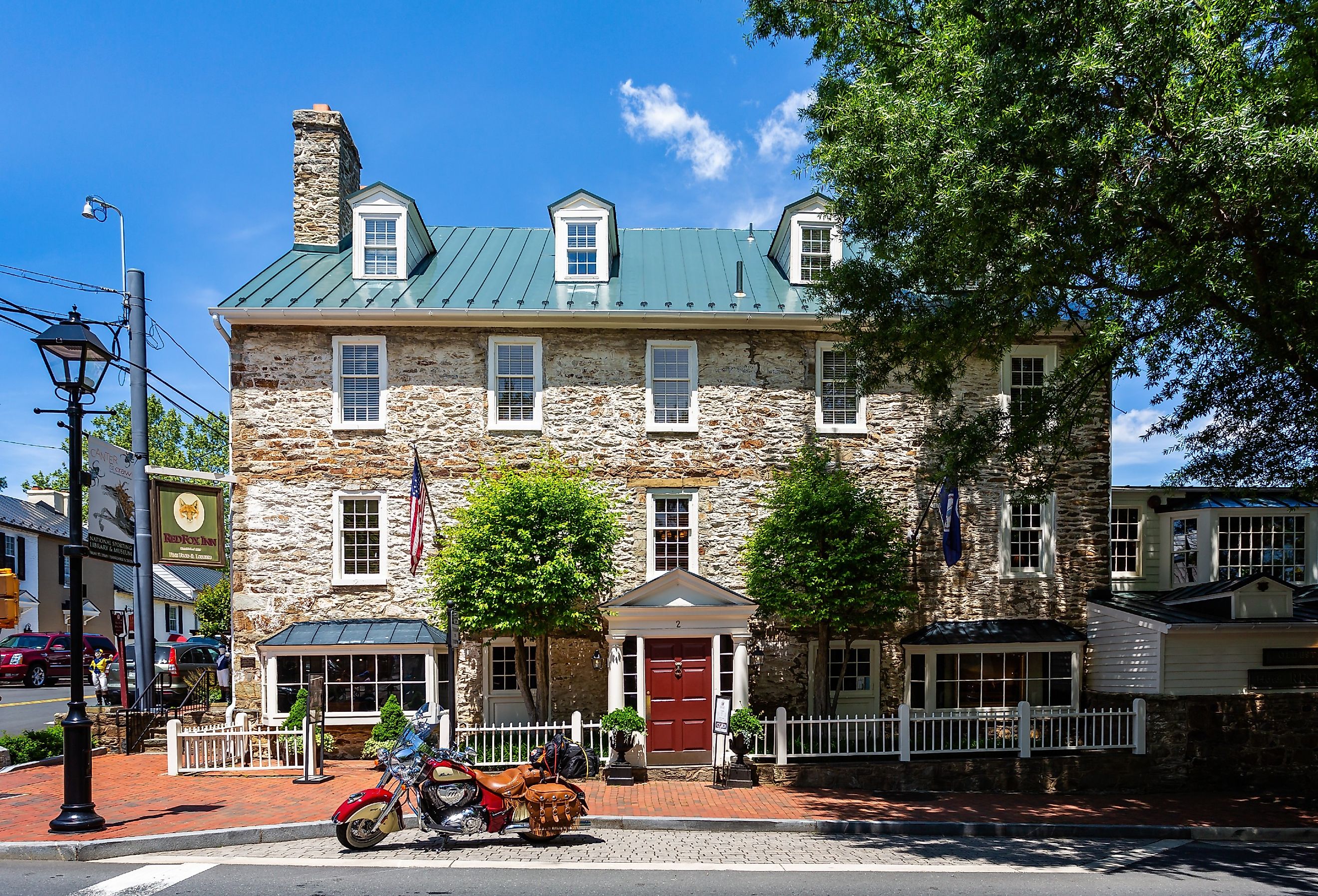 Indian 111 Classic Motorbike parked outside The Red Fox Inn and Tavern in Middleburg, Virginia. Image credit Nigel Jarvis via Shutterstock