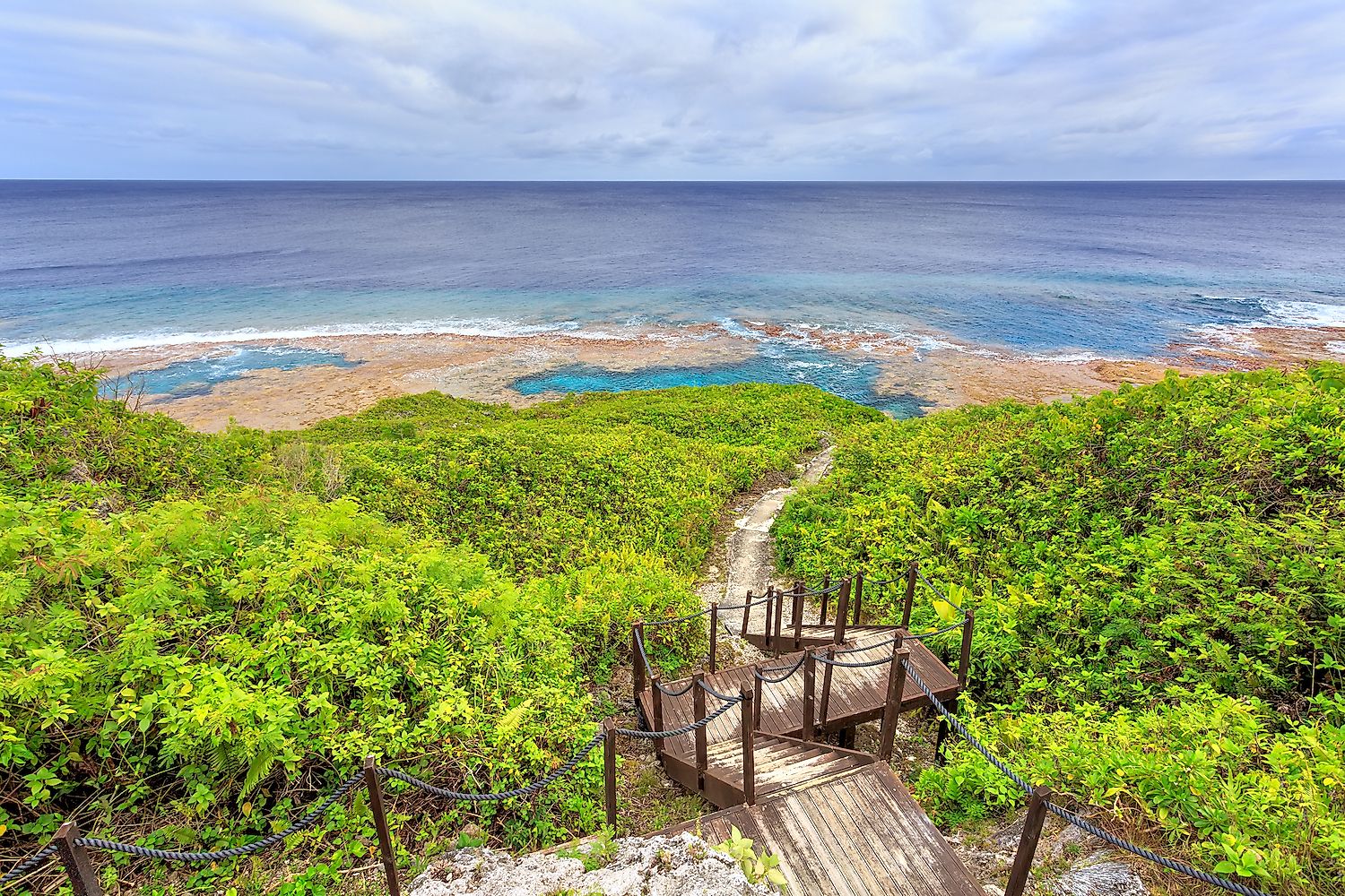 Sea track down to Hikutavake reef flats and pools, Niue. Image credit: Molly Brown NZ/Shutterstock.com