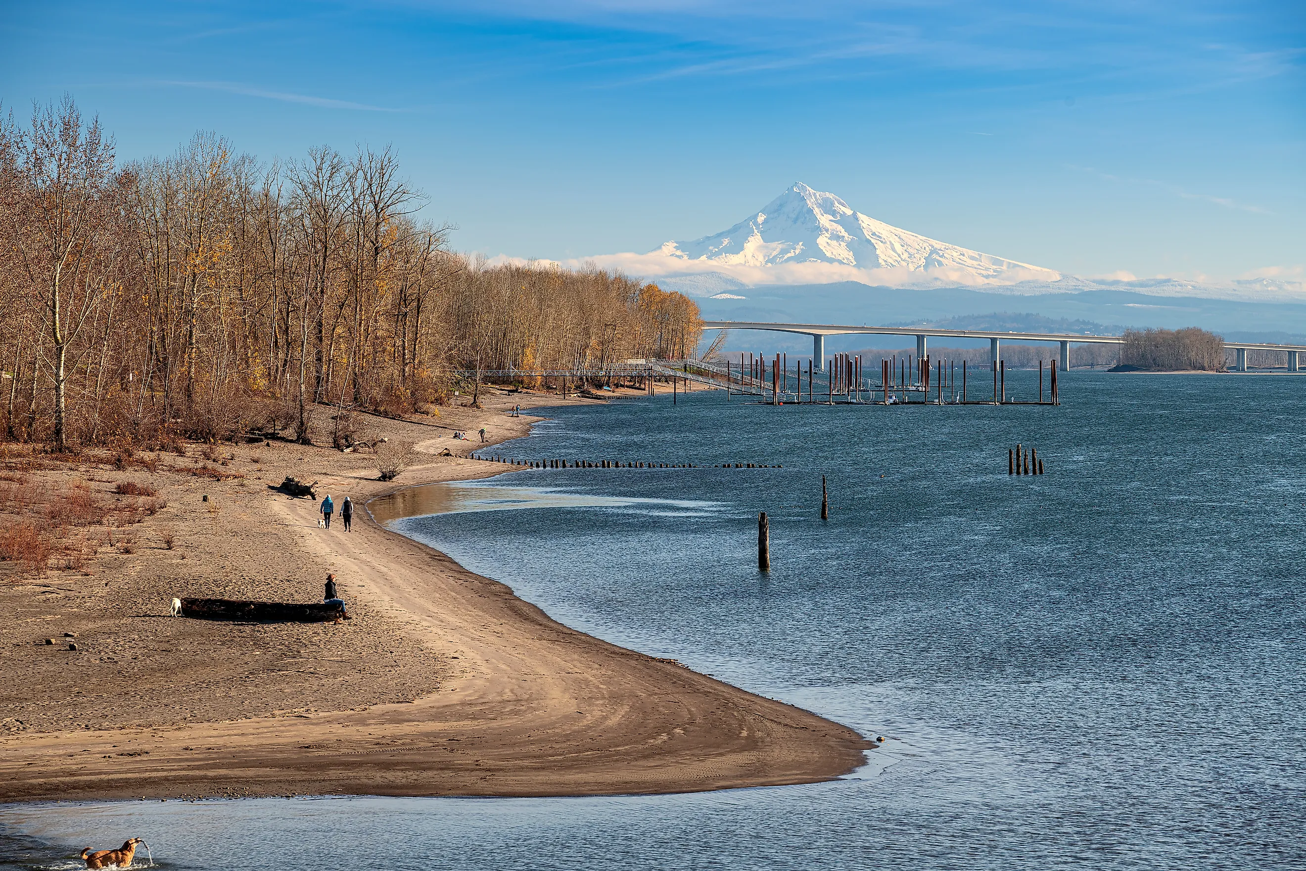 People walking by the river in Hood River, Oregon.