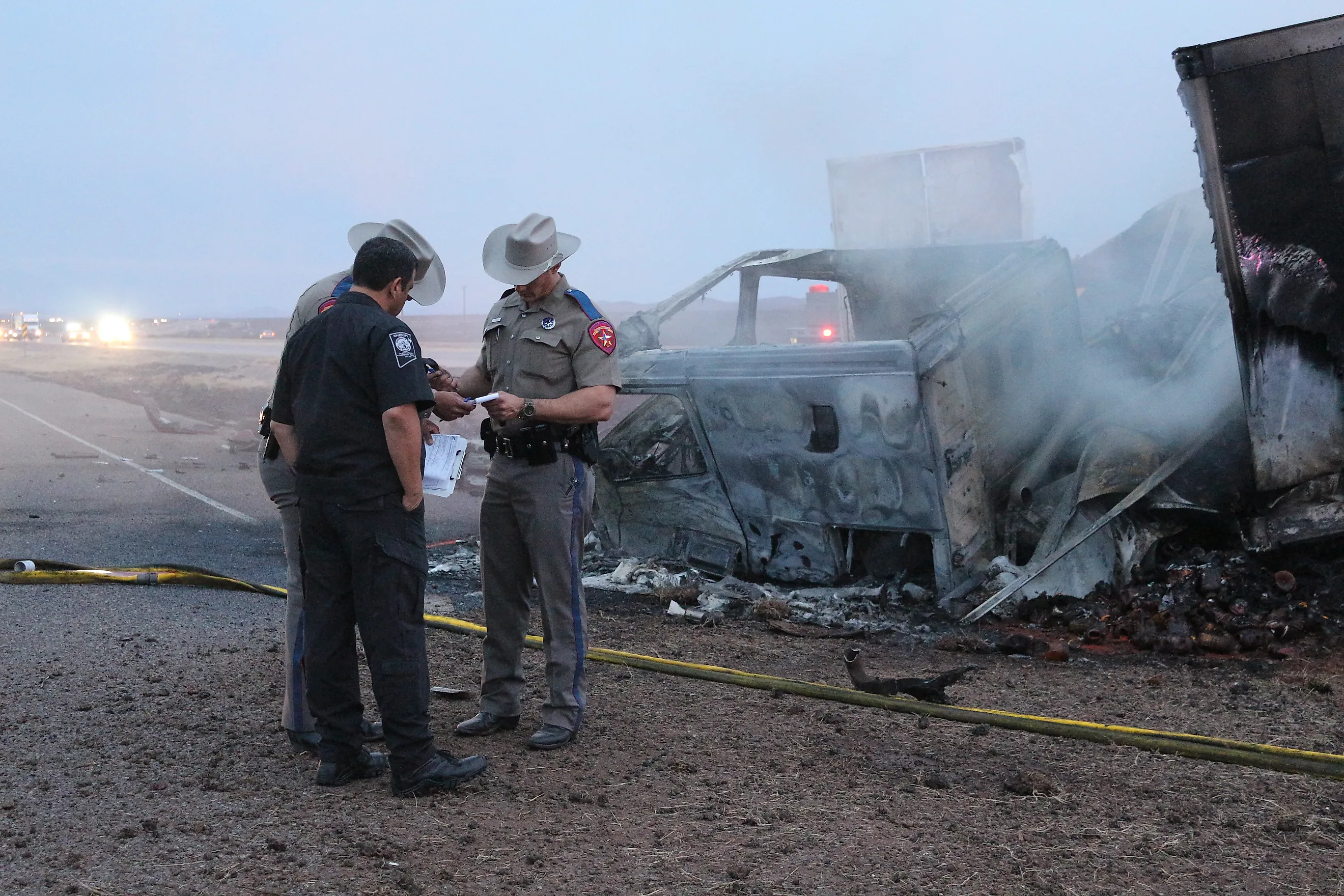 Deadly crash on Interstate 10 (I-10), Paramedics and Firefighters working on the road. 
