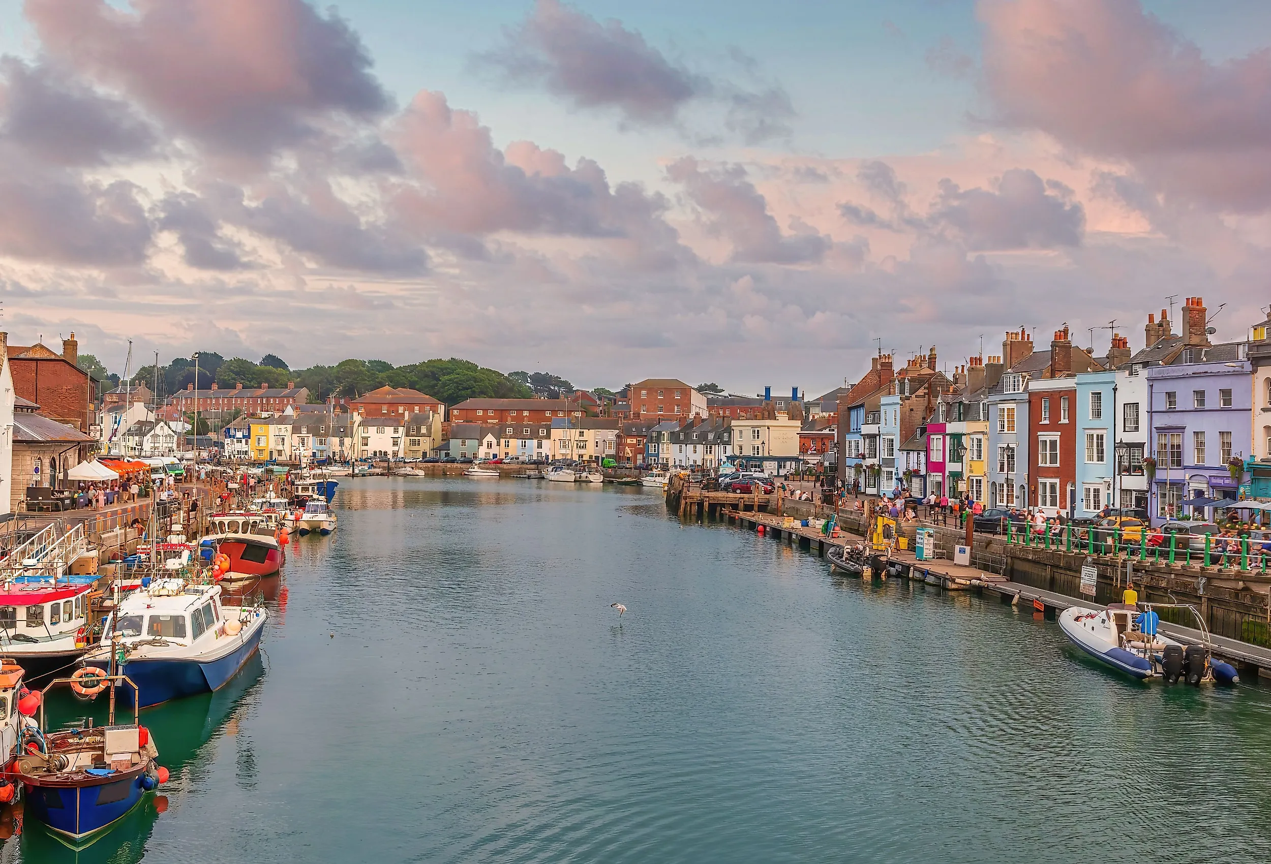 Boats at sunset in Weymouth, Dorset, UK.