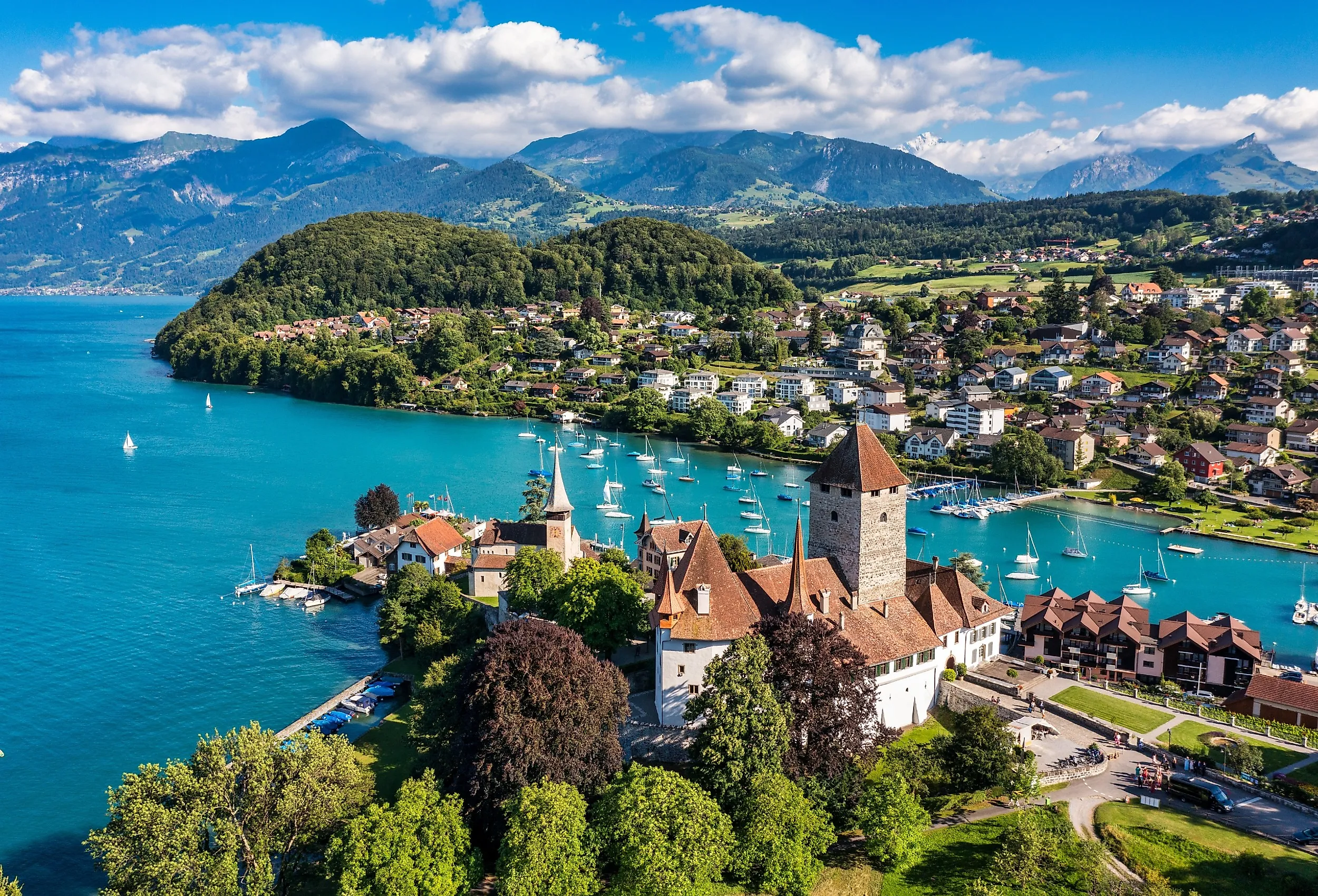 Spiez Church and Castle on the shore of Lake Thun in the Swiss canton of Bern at sunset, Spiez, Switzerland.