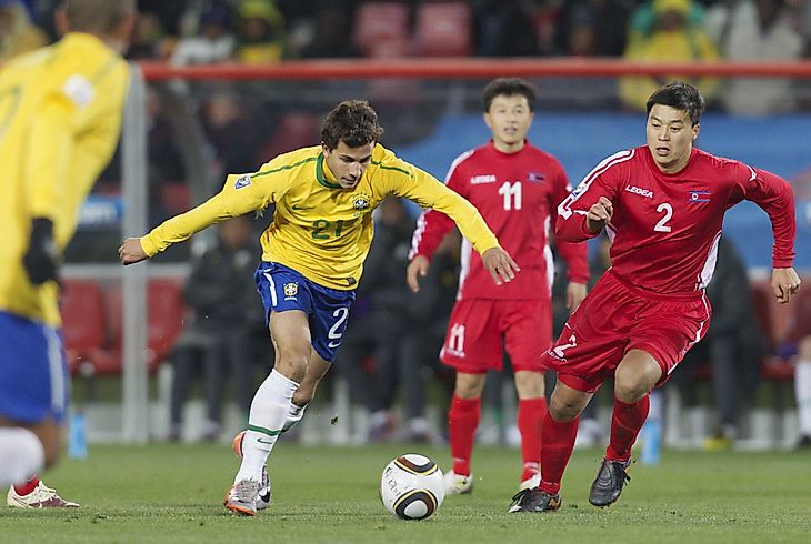 Team Brazil dukes it out with Team North Korea in international competition at the FIFA World Cup.